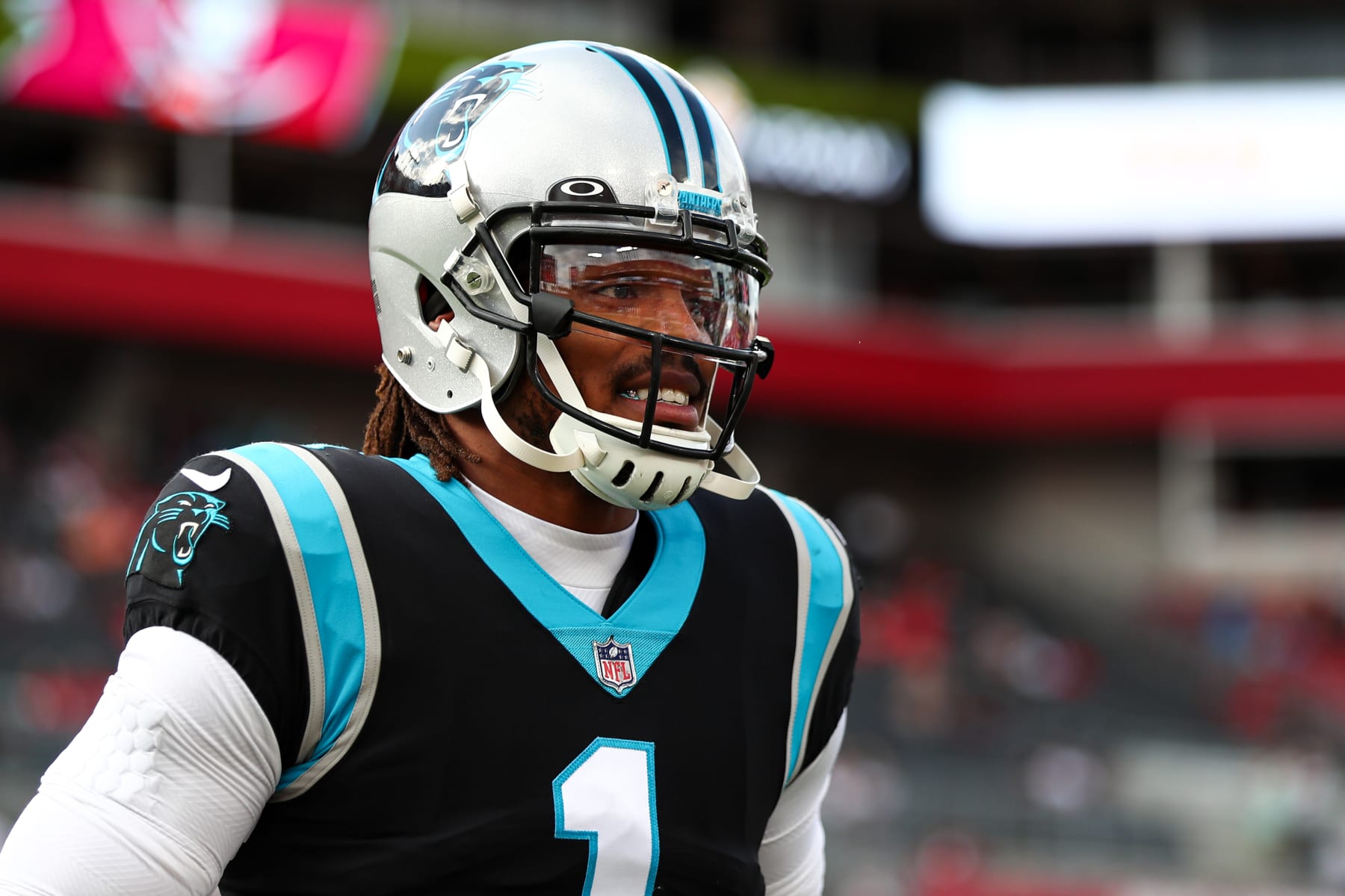 TAMPA, FL - JANUARY 9: Cam Newton #1 of the Carolina Panthers smiles prior to an NFL game against the Tampa Bay Buccaneers at Raymond James Stadium on January 9, 2022 in Tampa, Florida. (Photo by Kevin Sabitus/Getty Images)