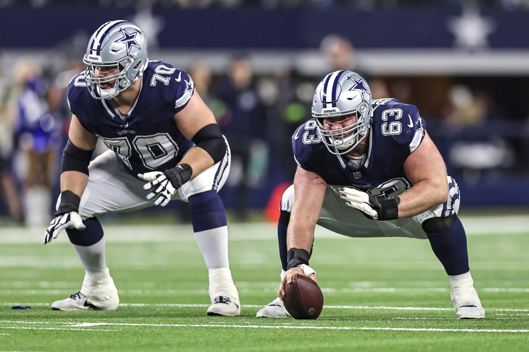 ARLINGTON, TX - DECEMBER 30: Dallas Cowboys center Tyler Biadasz (63) and guard Zack Martin (70) line up for the next play during the game between the Dallas Cowboys and the Detroit Lions on December 30, 2023 at AT&T Stadium in Arlington, Texas. (Photo by Matthew Pearce/Icon Sportswire via Getty Images)