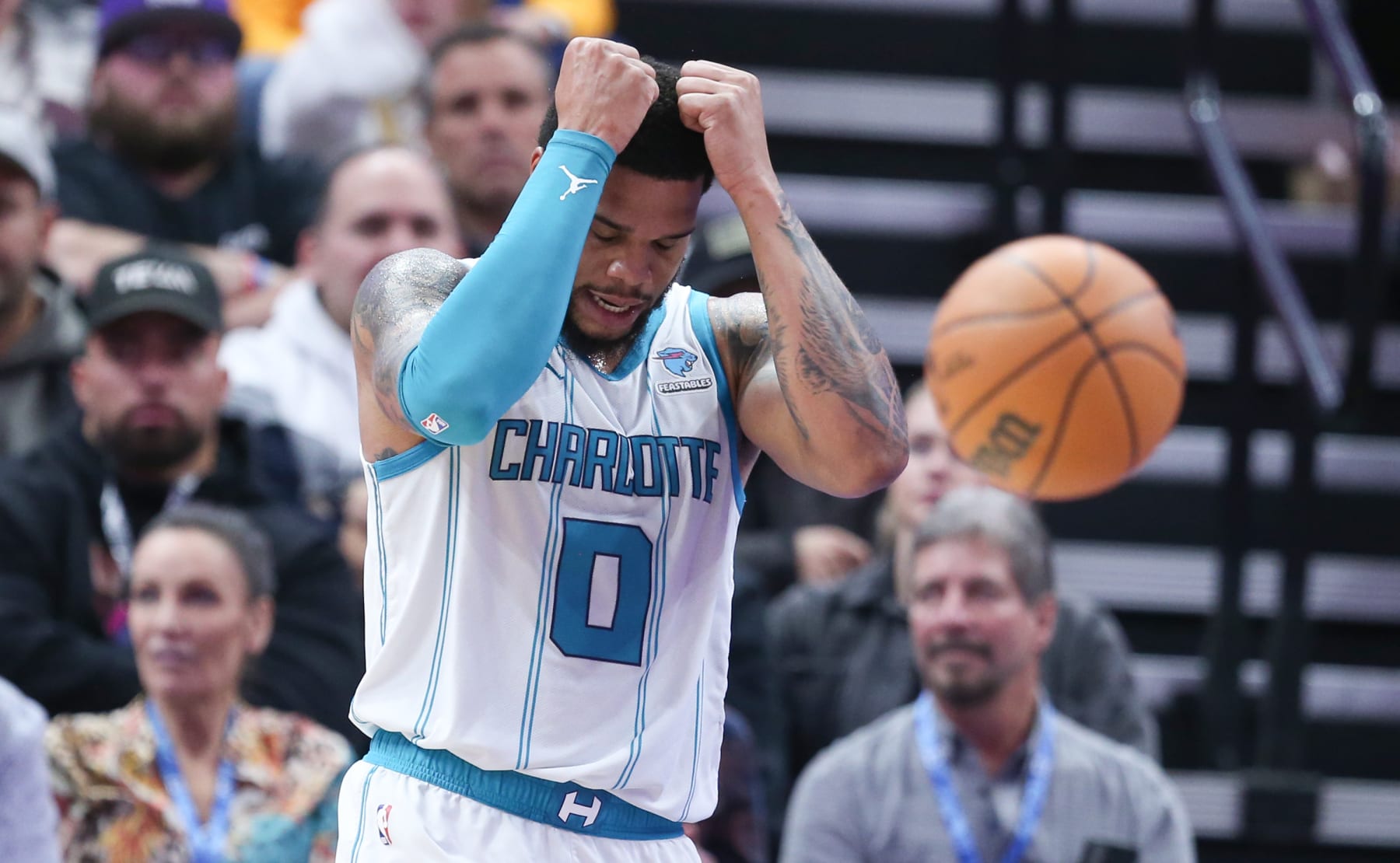 SALT LAKE CITY, UT - FEBRUARY 22:  Miles Bridges #0   of the Charlotte Hornets reacts after missing a shot against the Utah Jazz during the first half of their game at the Delta Center on February 22, 2024 in Salt Lake City, Utah.  NOTE TO USER: User expressly acknowledges and agrees that, by downloading and or using this Photograph, User is concenting to the terms and conditions of the Getty Images license Agreement. (Photo by Chris Gardner/Getty Images)