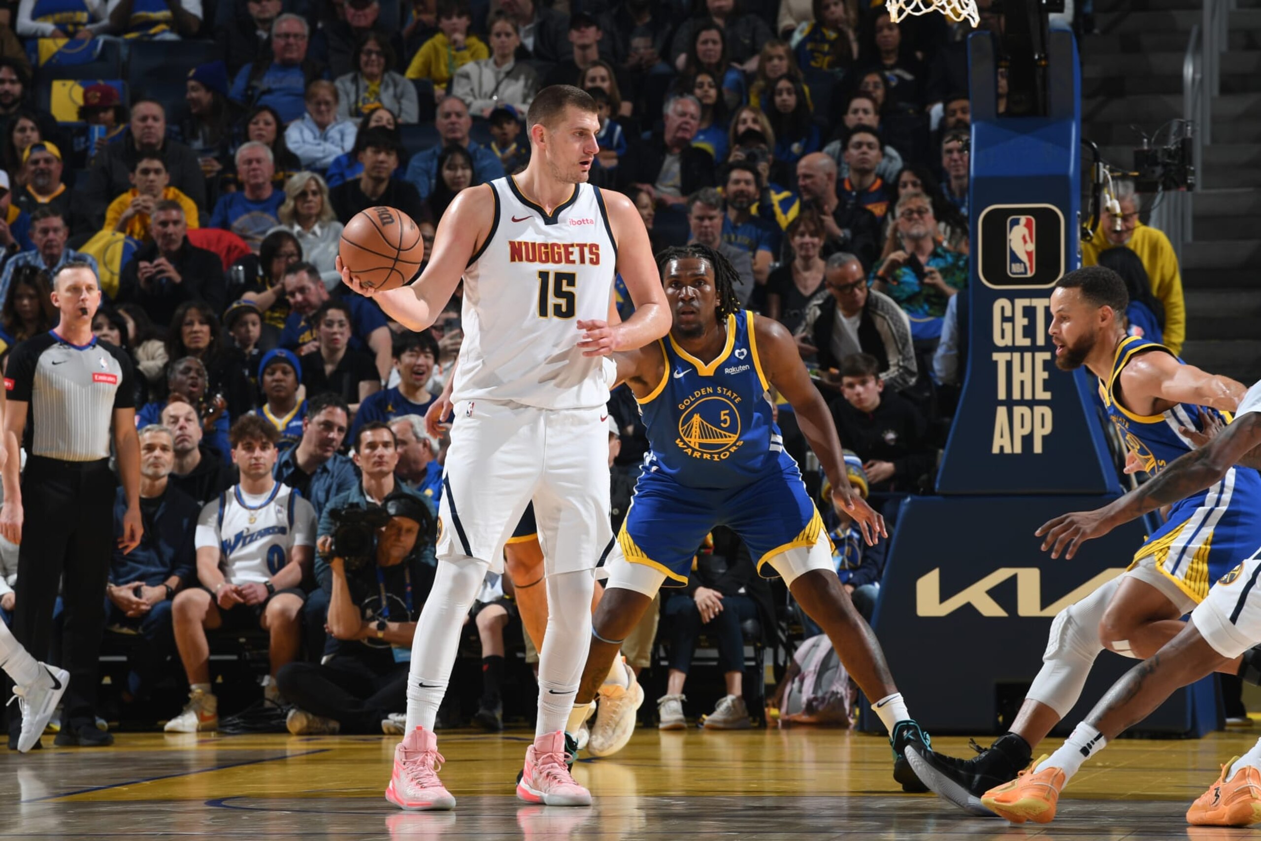 SAN FRANCISCO, CA - FEBRUARY 25: Nikola Jokic #15 of the Denver Nuggets handles the ball during the game against the Golden State Warriors on February 25, 2024 at Chase Center in San Francisco, California. NOTE TO USER: User expressly acknowledges and agrees that, by downloading and or using this photograph, user is consenting to the terms and conditions of Getty Images License Agreement. Mandatory Copyright Notice: Copyright 2024 NBAE (Photo by Noah Graham/NBAE via Getty Images) SAN FRANCISCO, CA - FEBRUARY 25: Nikola Jokic #15 of the Denver Nuggets handles the ball during the game against the Golden State Warriors on February 25, 2024 at Chase Center in San Francisco, California. NOTE TO USER: User expressly acknowledges and agrees that, by downloading and or using this photograph, user is consenting to the terms and conditions of Getty Images License Agreement. Mandatory Copyright Notice: Copyright 2024 NBAE (Photo by Noah Graham/NBAE via Getty Images)