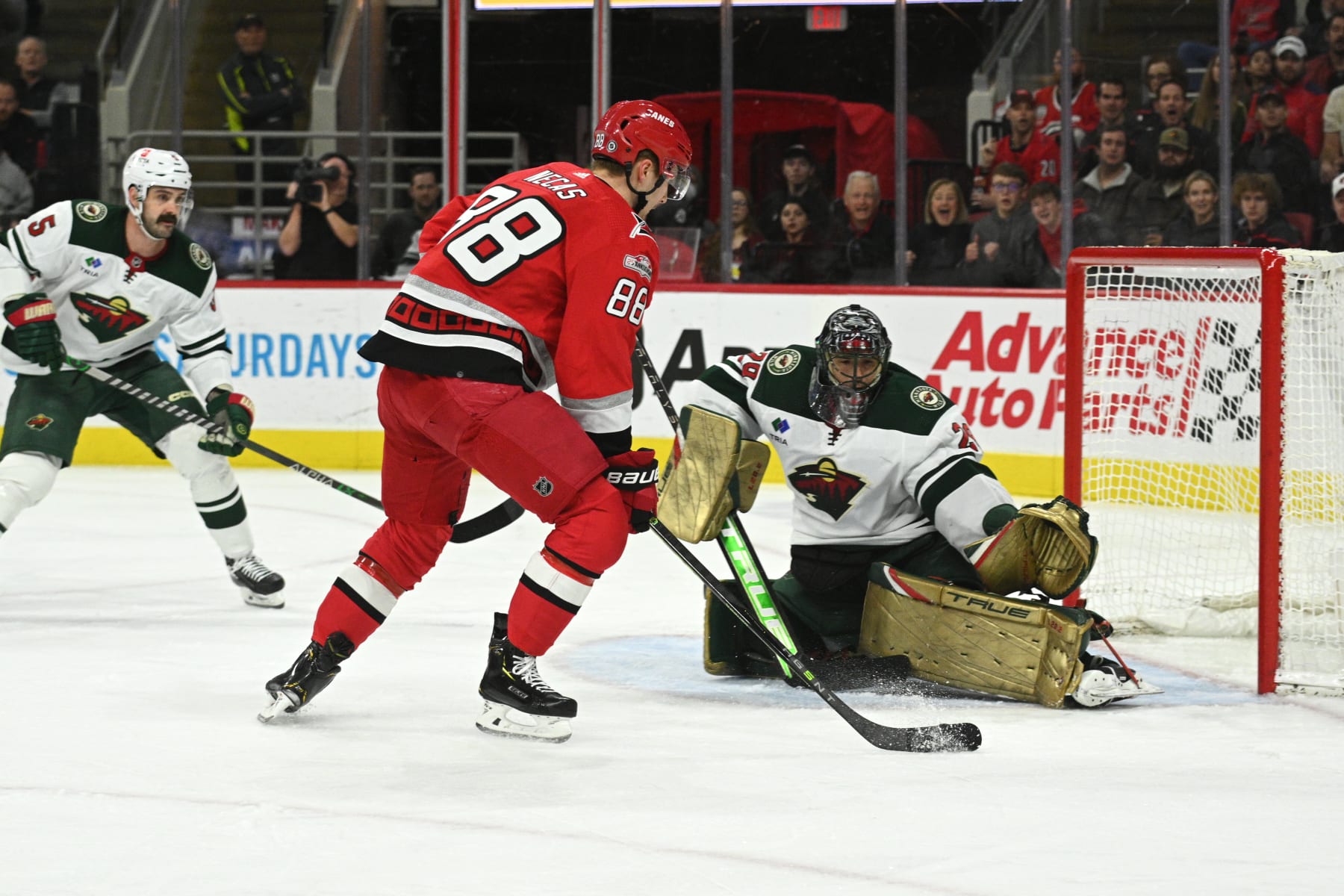 RALEIGH, NC - JANUARY 19: Carolina Hurricanes Right Wing Martin Necas (88) attempts a shot on Minnesota Wild Goalie Marc-Andre Fleury (29) during the game between the Minnesota Wild and the Carolina Hurricanes on January 19, 2023 at PNC Arena in Raleigh, North Carolina. (Photo by Katherine Gawlik/Icon Sportswire via Getty Images)