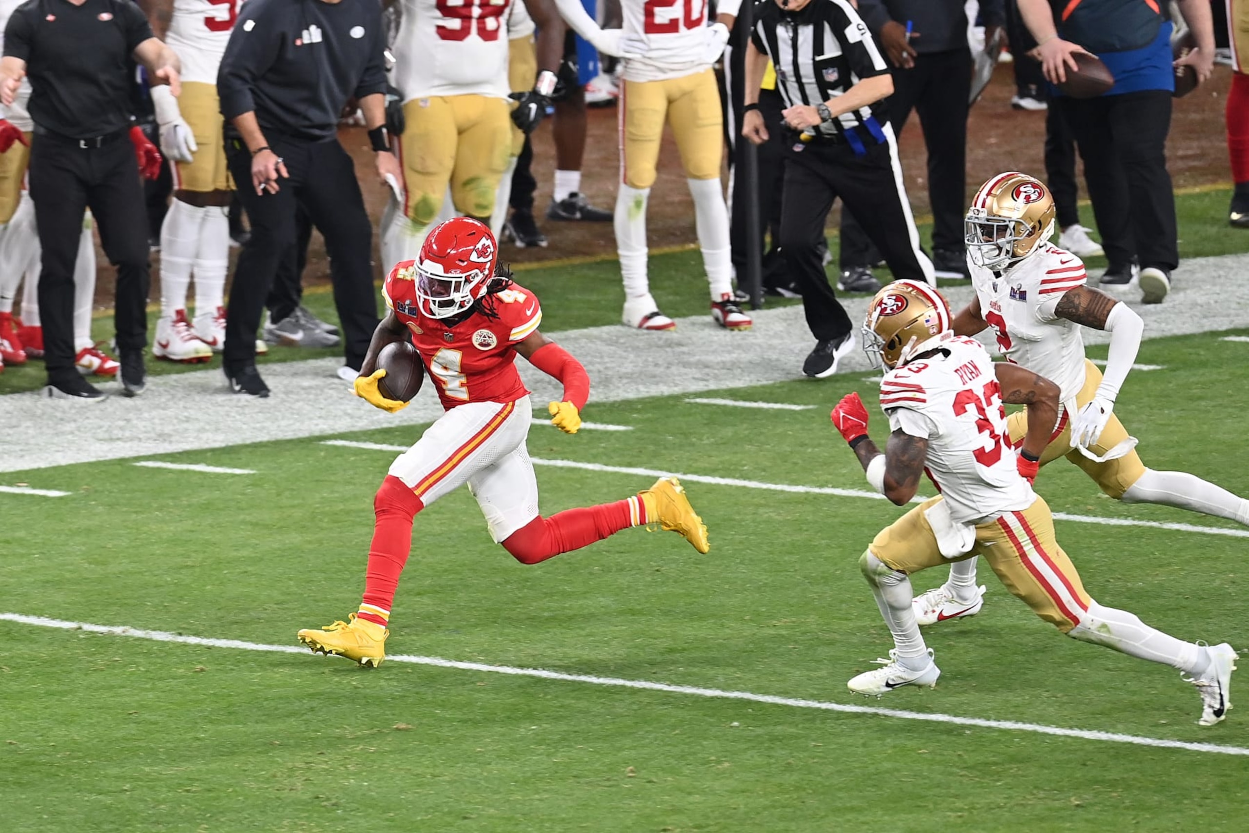LAS VEGAS, NEVADA - FEBRUARY 11: Rashee Rice #4 of the Kansas City Chiefs run with the ball pursued by Deommodore Lenoir #2 and Logan Ryan #2 of the San Francisco 49ers in the first half during Super Bowl LVIII at Allegiant Stadium on February 11, 2024 in Las Vegas, Nevada. (Photo by Focus on Sport/Getty Images) LAS VEGAS, NEVADA - FEBRUARY 11: Rashee Rice #4 of the Kansas City Chiefs run with the ball pursued by Deommodore Lenoir #2 and Logan Ryan #2 of the San Francisco 49ers in the first half during Super Bowl LVIII at Allegiant Stadium on February 11, 2024 in Las Vegas, Nevada. (Photo by Focus on Sport/Getty Images)