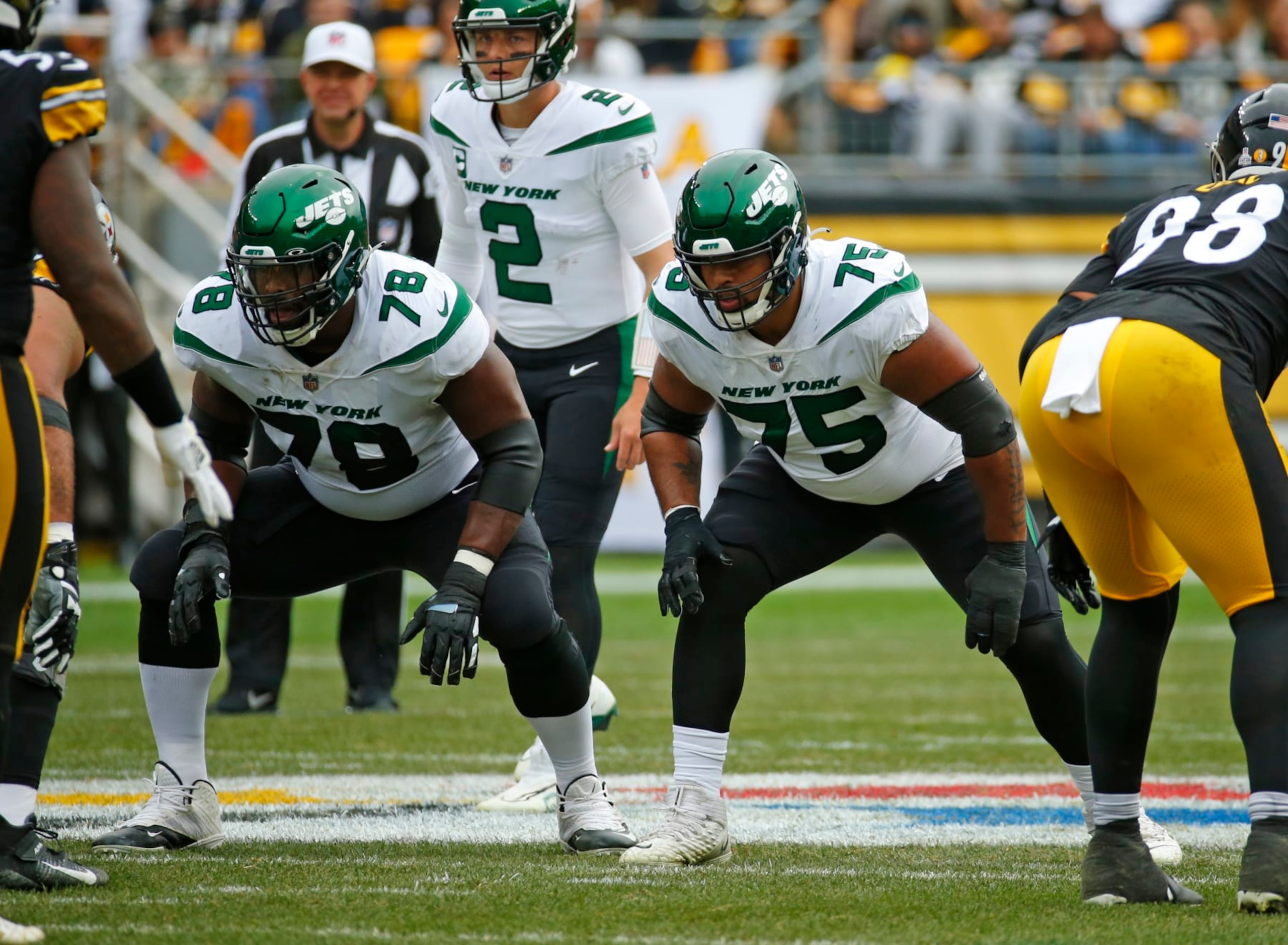 PITTSBURGH, PA - OCTOBER 02:  Laken Tomlinson #78 and Alijah Vera-Tucker #75 of the New York Jets in action against the Pittsburgh Steelers on October 2, 2022 at Acrisure Stadium in Pittsburgh, Pennsylvania.  (Photo by Justin K. Aller/Getty Images)