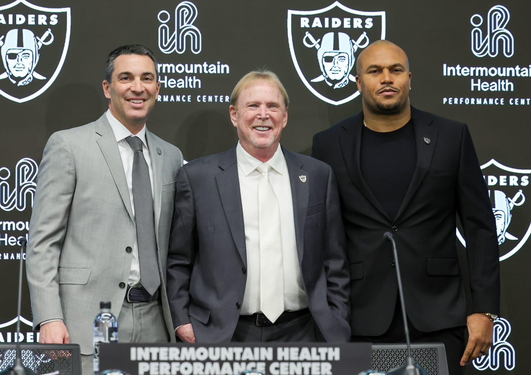 General manager Tom Telesco (left), owner and managing general partner Mark Davis (center), head coach Antonio Pierce (right)