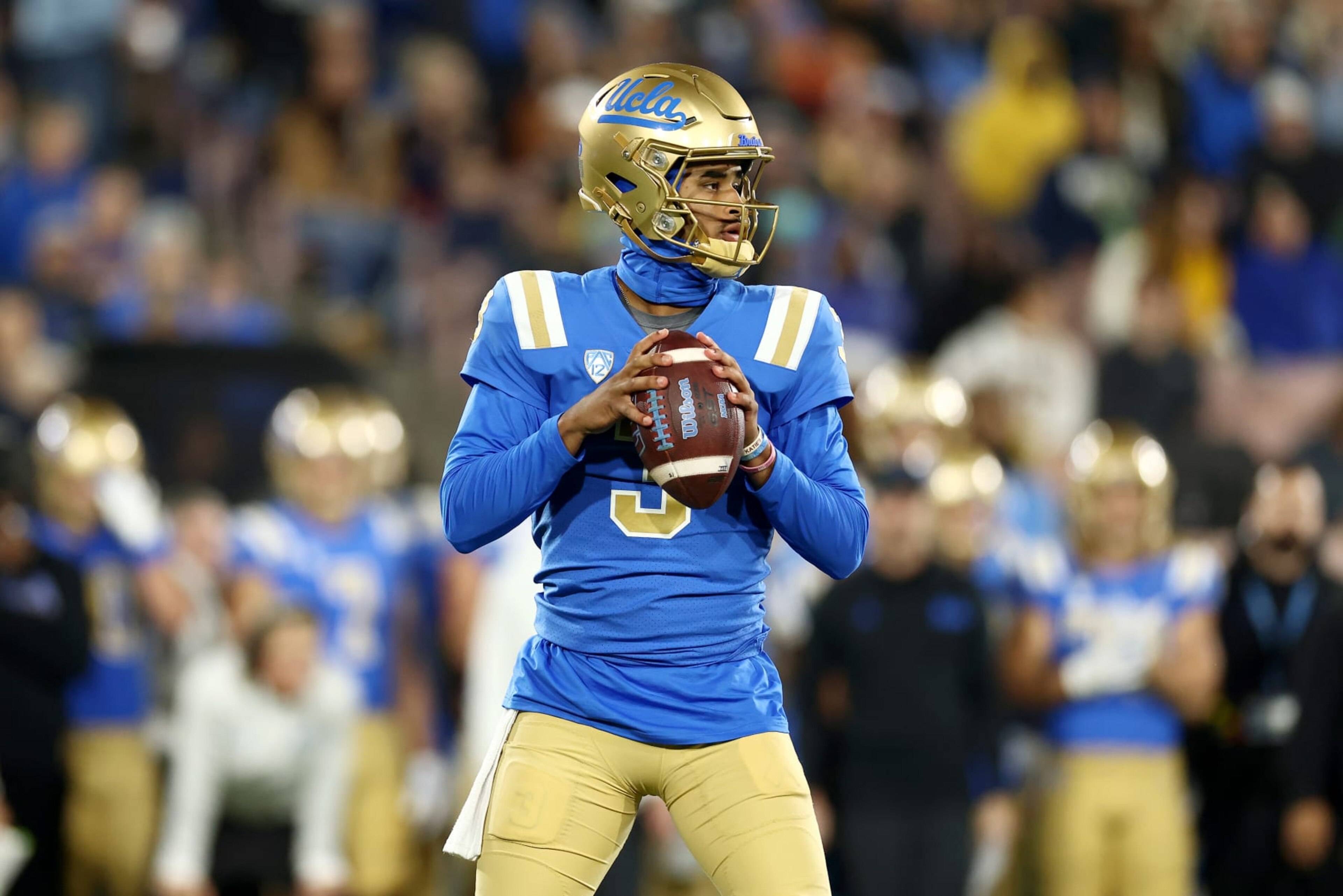 PASADENA, CALIFORNIA - NOVEMBER 25: Dante Moore #3 of the UCLA Bruins looks to pass the ball during the first quarter against the California Golden Bears at Rose Bowl Stadium on November 25, 2023 in Pasadena, California. (Photo by Katelyn Mulcahy/Getty Images)