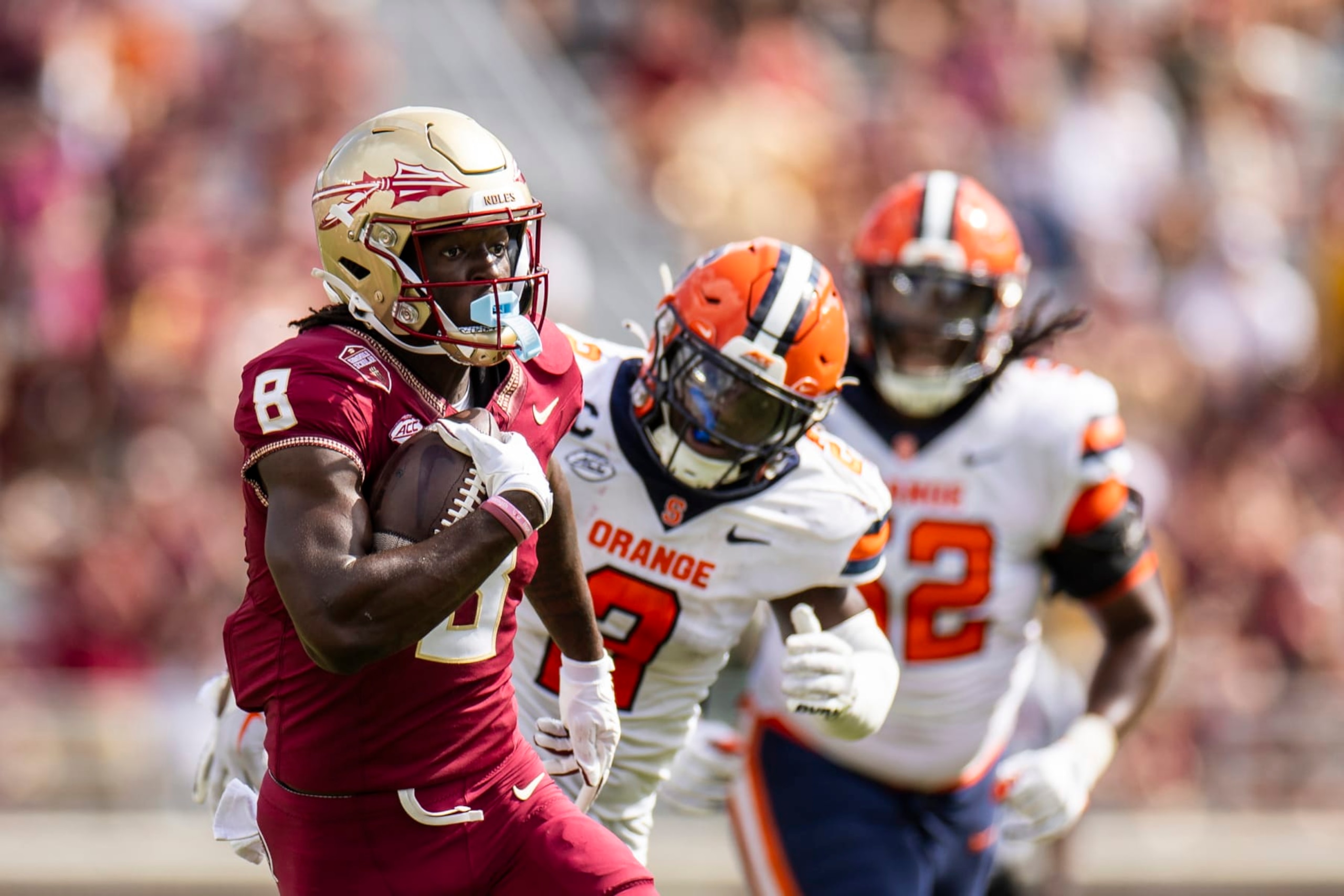 TALLAHASSEE, FLORIDA - OCTOBER 14: Hykeem Williams #8 of the Florida State Seminoles runs the ball during the second half of a game against the Syracuse Orangeat Doak Campbell Stadium on October 14, 2023 in Tallahassee, Florida. (Photo by James Gilbert/Getty Images)