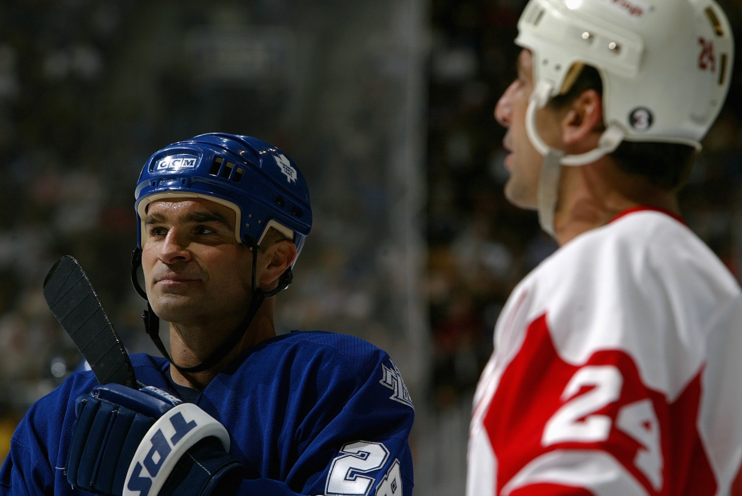 TORONTO - OCTOBER 1:  Tie Domi #28 of the Toronto Maple Leafs and Chris Chelios #24 of the Detroit Red Wings look on during their NHL pre-season game at the Air Canada Centre on October 1, 2005 in Toronto, Ontario, Canada.  The Maple Leafs beat the Red Wings 4-1. (Photo By Dave Sandford/Getty Images)