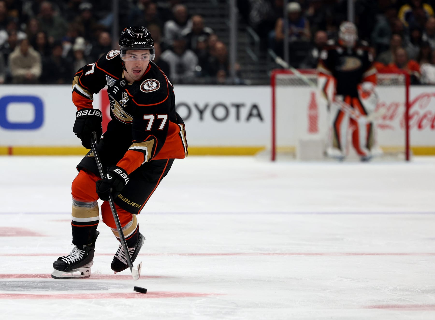 LOS ANGELES, CALIFORNIA - FEBRUARY 24: Frank Vatrano #77 of the Anaheim Duck controls the puck as he skates during a 3-2 Los Angeles Kings overtime shootout win at Crypto.com Arena on February 24, 2024 in Los Angeles, California. (Photo by Harry How/Getty Images)