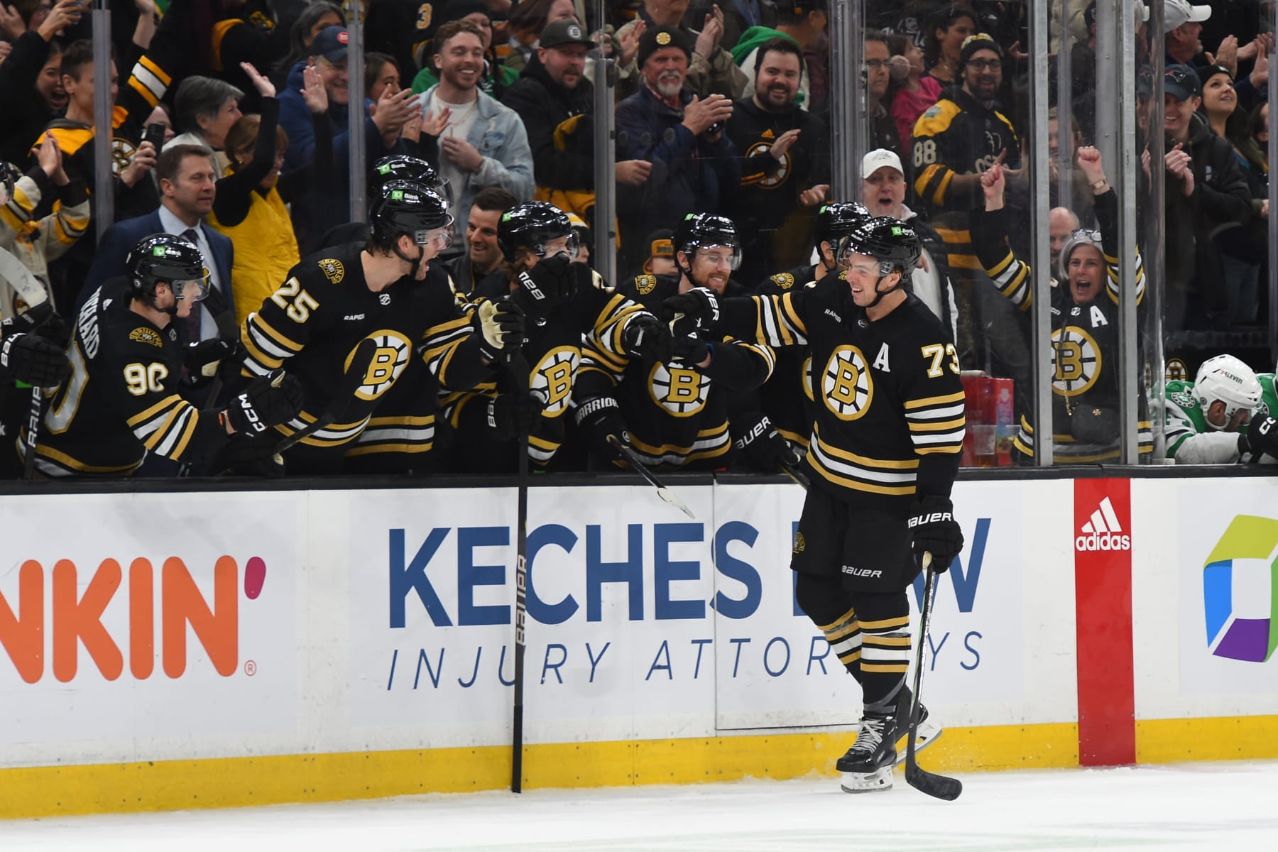 BOSTON, MASSACHUSETTS - FEBRUARY 19: Charlie McAvoy #73 of the Boston Bruins celebrates his shootout goal against the Dallas Stars at the TD Garden on February 19, 2024 in Boston, Massachusetts. (Photo by Steve Babineau/NHLI via Getty Images)