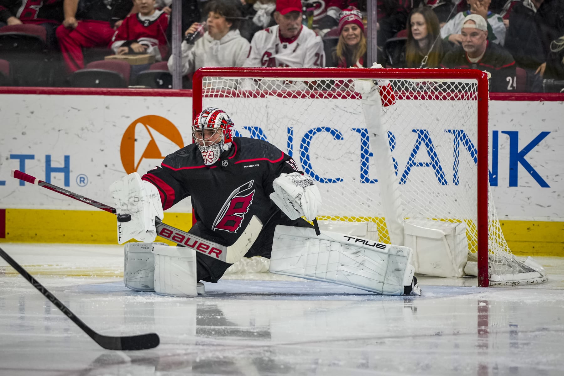 RALEIGH, NORTH CAROLINA - FEBRUARY 22: Pyotr Kochetkov #52 of the Carolina Hurricanes makes a save during the second period of an NHL hockey game against the Florida Panthers at PNC Arena on February 22, 2024 in Raleigh, North Carolina. (Photo by Josh Lavallee/NHLI via Getty Images)