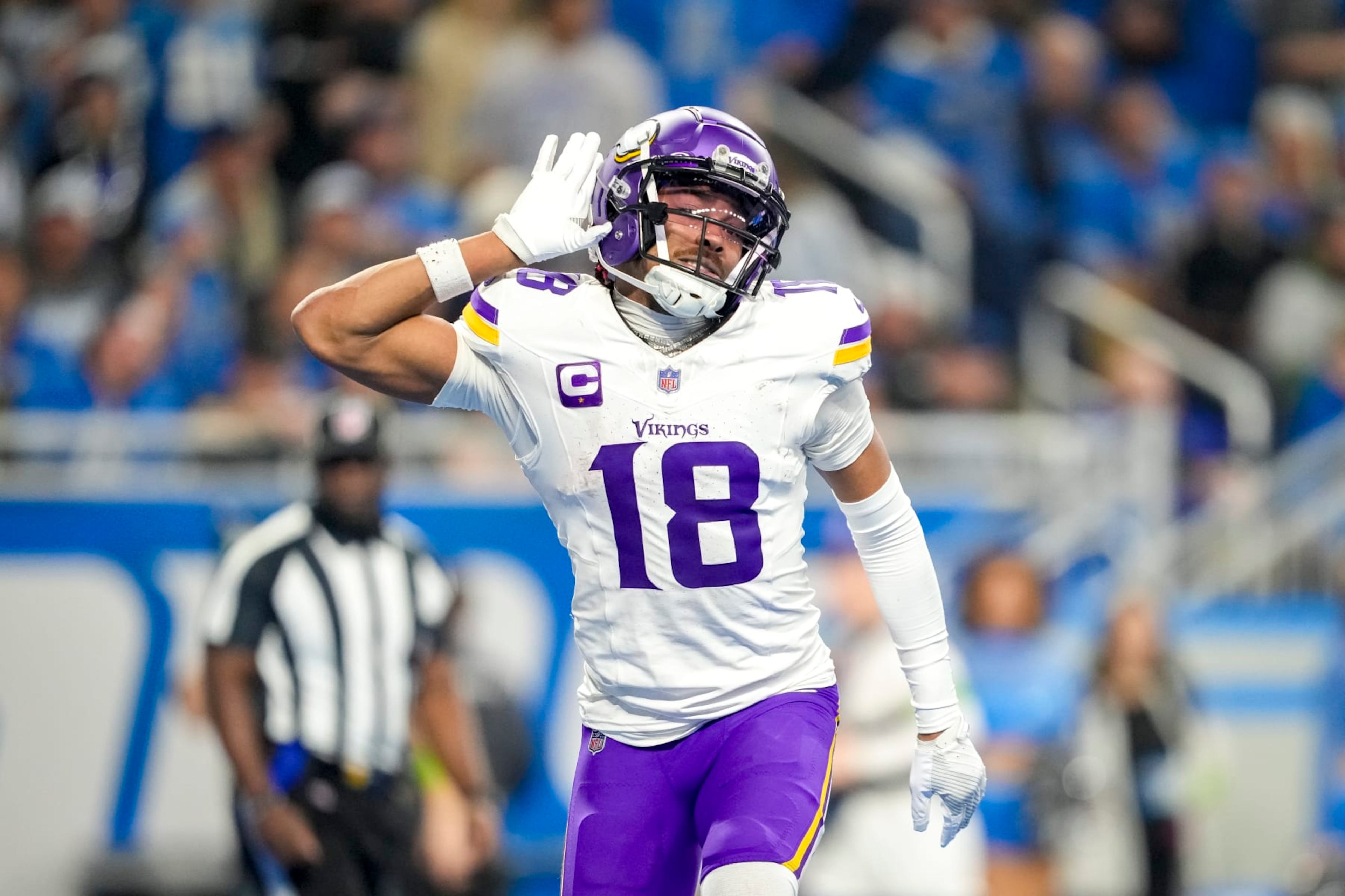 DETROIT, MICHIGAN - JANUARY 07: Justin Jefferson #18 of the Minnesota Vikings celebrates after a touchdown during the third quarter in the game against the Detroit Lions at Ford Field on January 07, 2024 in Detroit, Michigan. (Photo by Nic Antaya/Getty Images)