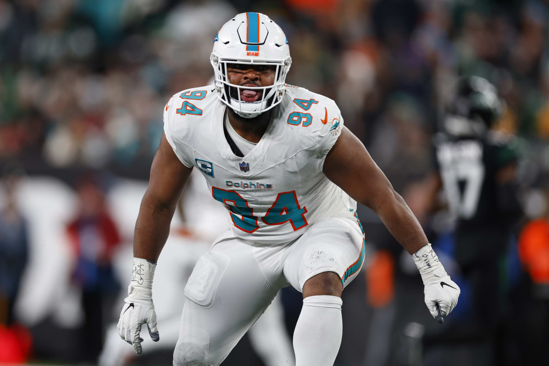 EAST RUTHERFORD, NEW JERSEY - NOVEMBER 24: Defensive tackle Christian Wilkins #94 of the Miami Dolphins in action against the New York Jets during a football game at MetLife Stadium on November 24, 2023 in East Rutherford, New Jersey. (Photo by Rich Schultz/Getty Images)