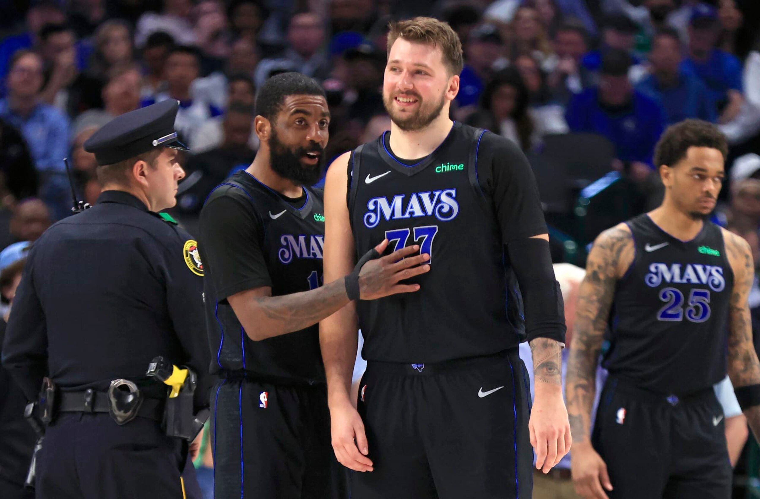 DALLAS, TX - FEBRUARY 22: Kyrie Irving #11 of the Dallas Mavericks and teammate Luka Doncic #77 react after a basket against the Phoenix Suns in the second half at American Airlines Center on February 22, 2024 in Dallas, Texas. NOTE TO USER: User expressly acknowledges and agrees that, by downloading and or using this photograph, User is consenting to the terms and conditions of the Getty Images License Agreement. (Photo by Ron Jenkins/Getty Images) DALLAS, TX - FEBRUARY 22: Kyrie Irving #11 of the Dallas Mavericks and teammate Luka Doncic #77 react after a basket against the Phoenix Suns in the second half at American Airlines Center on February 22, 2024 in Dallas, Texas. NOTE TO USER: User expressly acknowledges and agrees that, by downloading and or using this photograph, User is consenting to the terms and conditions of the Getty Images License Agreement. (Photo by Ron Jenkins/Getty Images)