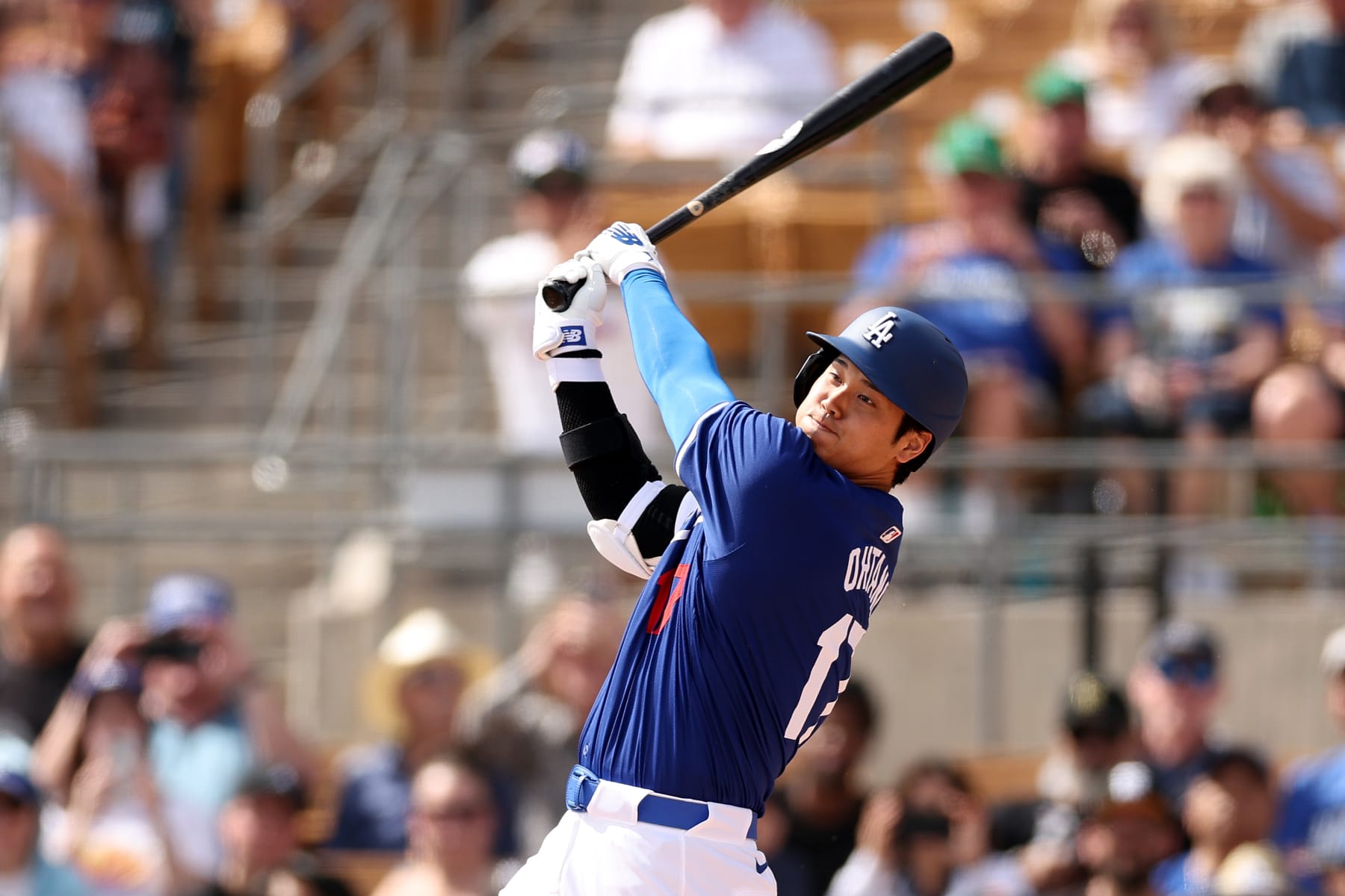 GLENDALE, ARIZONA - FEBRUARY 27: Shohei Ohtani #17 of the Los Angeles Dodgers bats in the first inning during a game against the Chicago White Sox at Camelback Ranch on February 27, 2024 in Glendale, Arizona. (Photo by Christian Petersen/Getty Images)