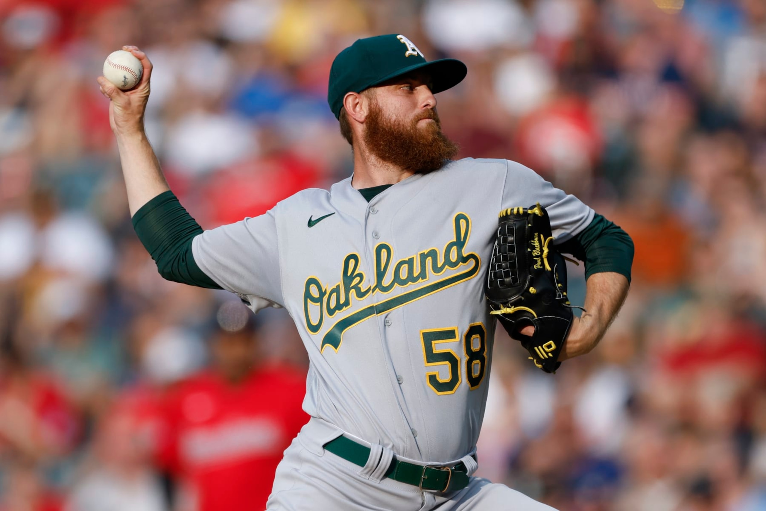 CLEVELAND, OH - JUNE 21: Paul Blackburn #58 of the Oakland Athletics pitches during the first inning against the Cleveland Guardians at Progressive Field on June 21, 2023 in Cleveland, Ohio. (Photo by Ron Schwane/Getty Images)