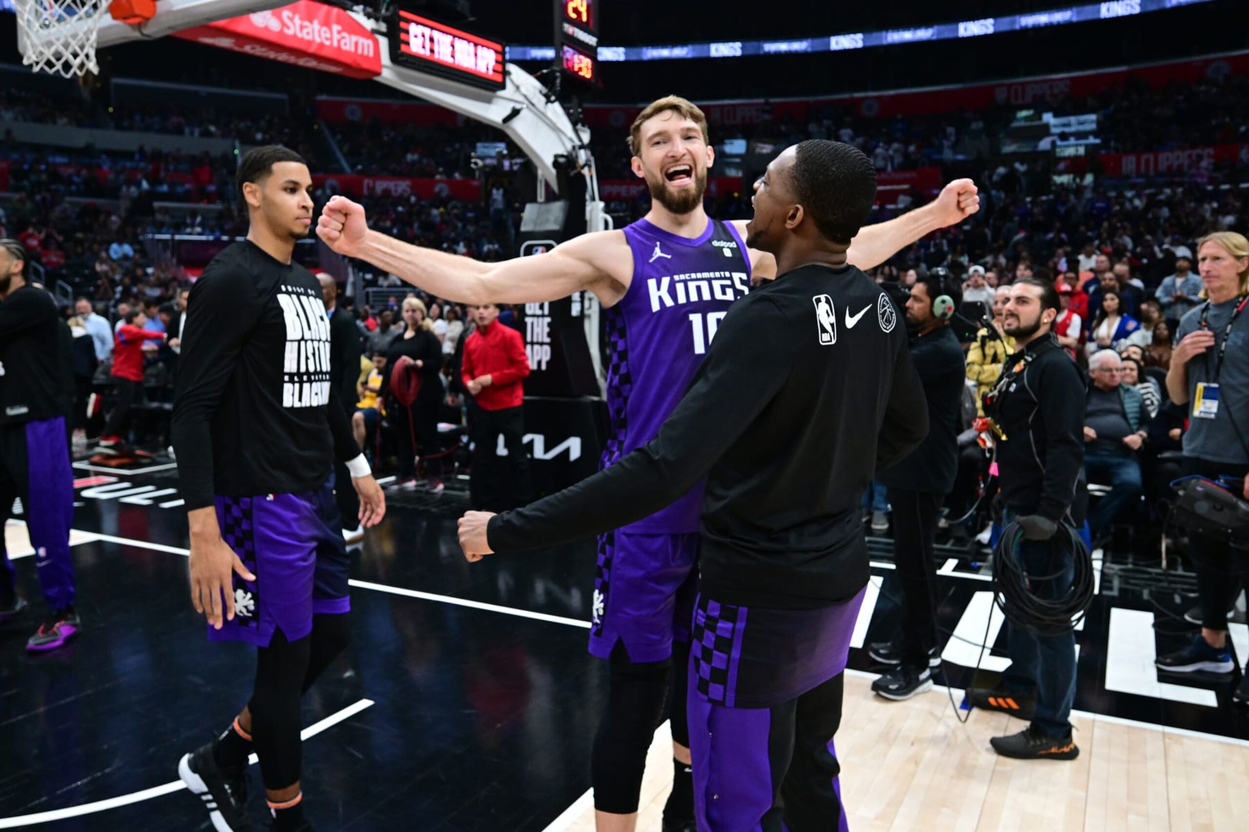 Keegan Murray, Domantas Sabonis and De'Aaron Fox Keegan Murray, Domantas Sabonis and De'Aaron Fox