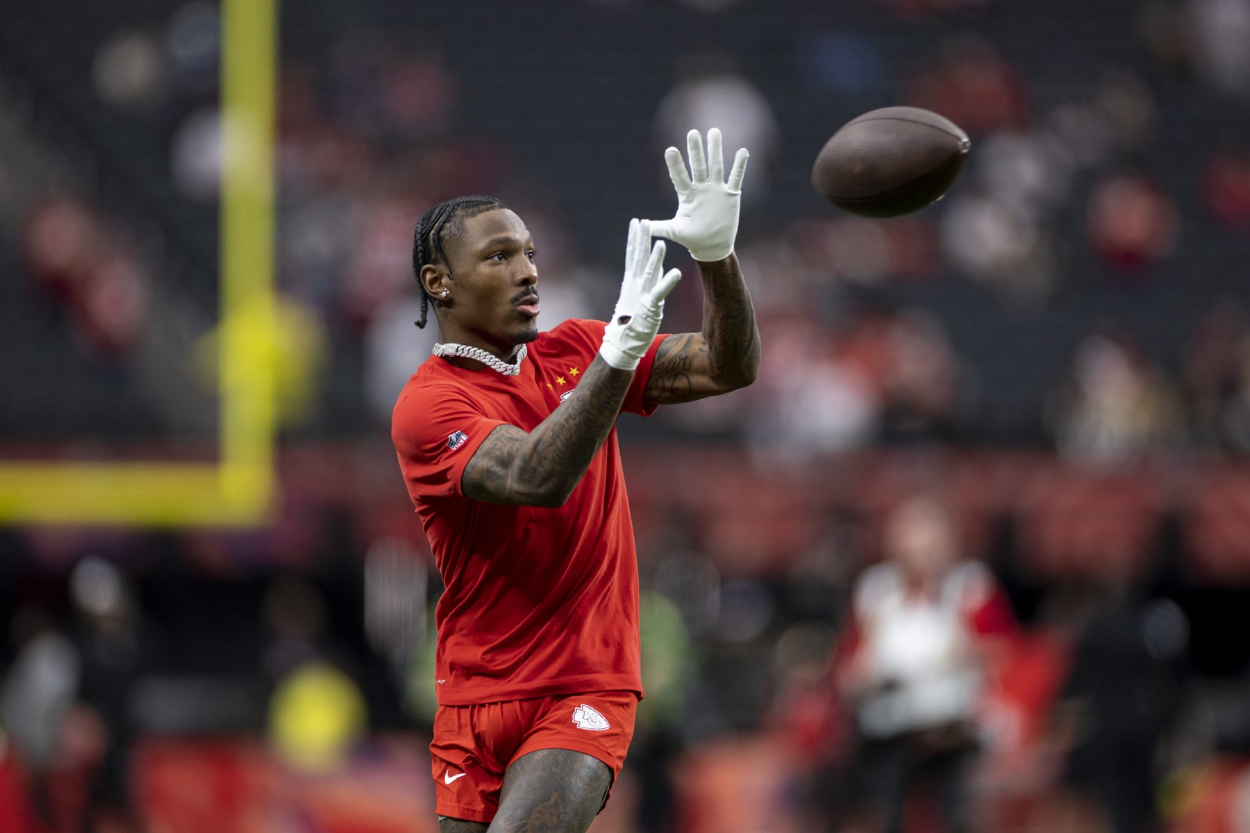 LAS VEGAS, NEVADA - FEBRUARY 11: Mecole Hardman Jr. #12 of the Kansas City Chiefs completes a pass prior to the NFL Super Bowl 58 football game between the San Francisco 49ers and the Kansas City Chiefs at Allegiant Stadium on February 11, 2024 in Las Vegas, Nevada. (Photo by Michael Owens/Getty Images)