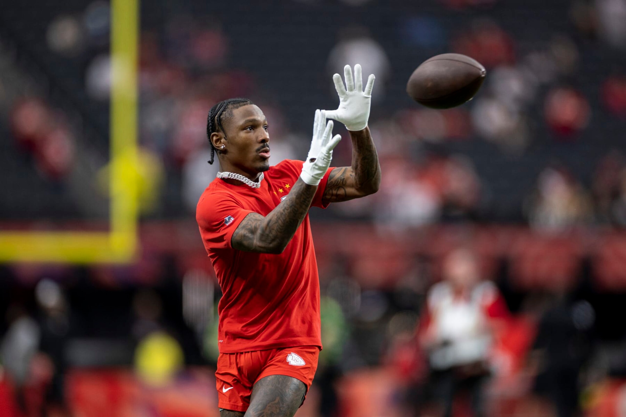 LAS VEGAS, NEVADA - FEBRUARY 11: Mecole Hardman Jr. #12 of the Kansas City Chiefs completes a pass prior to the NFL Super Bowl 58 football game between the San Francisco 49ers and the Kansas City Chiefs at Allegiant Stadium on February 11, 2024 in Las Vegas, Nevada. (Photo by Michael Owens/Getty Images)
