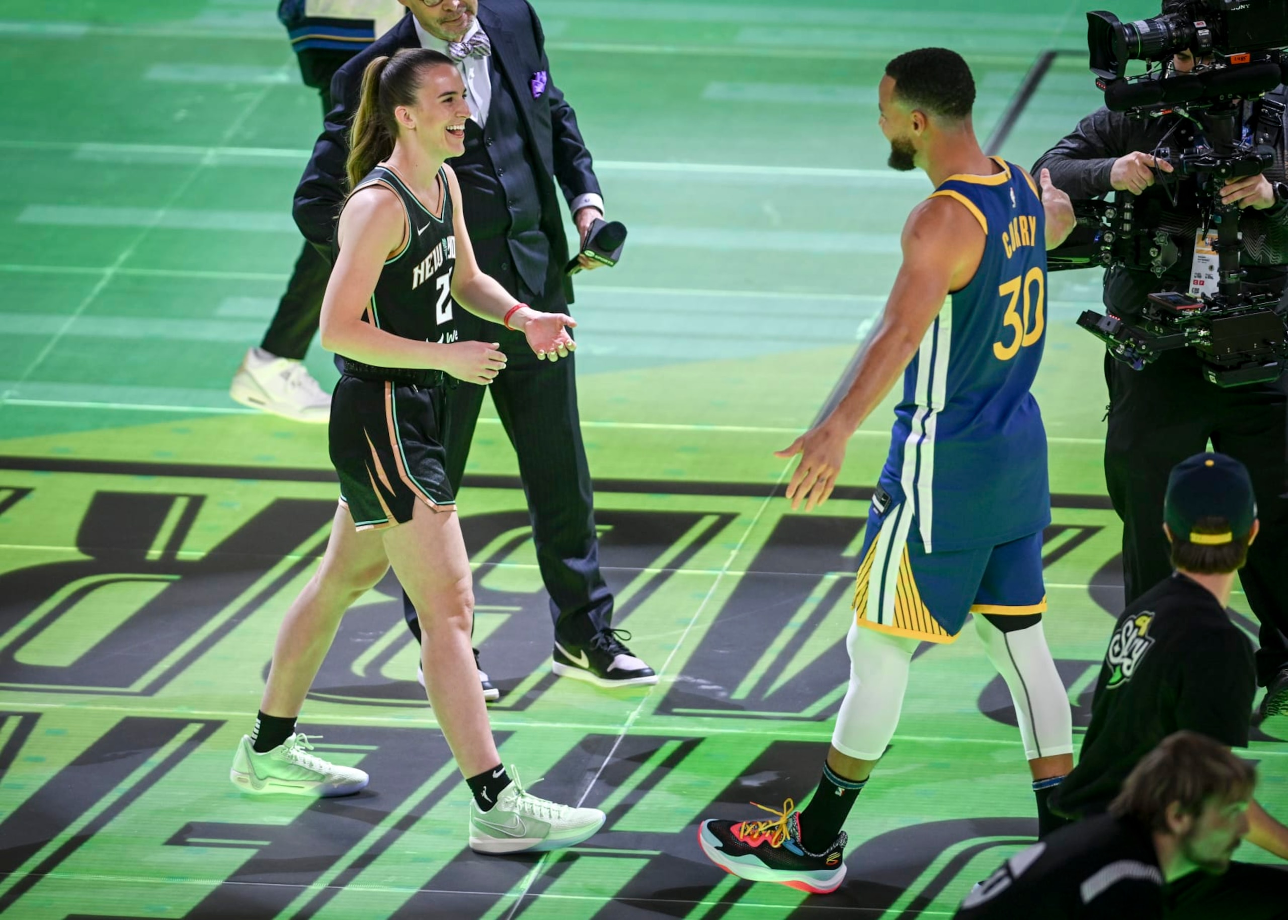 Sabrina Ionescu and Stephen Curry