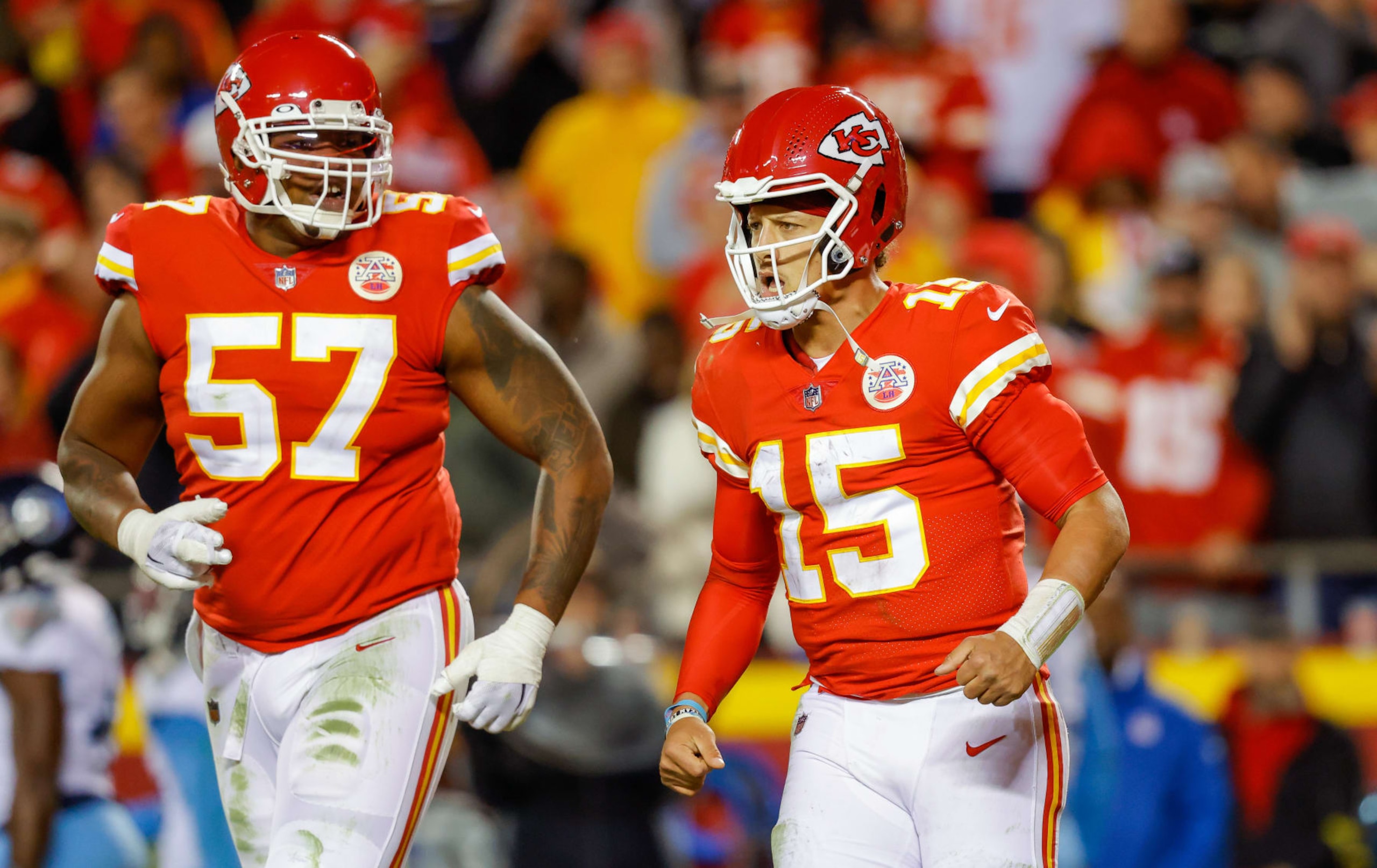 KANSAS CITY, MO - NOVEMBER 06: Patrick Mahomes #15 of the Kansas City Chiefs and Orlando Brown Jr. #57 of the Kansas City Chiefs run off the field after a two-point conversion play in the fourth quarter against the Tennessee Titans at Arrowhead Stadium on November 6, 2022 in Kansas City, Missouri. (Photo by David Eulitt/Getty Images) KANSAS CITY, MO - NOVEMBER 06: Patrick Mahomes #15 of the Kansas City Chiefs and Orlando Brown Jr. #57 of the Kansas City Chiefs run off the field after a two-point conversion play in the fourth quarter against the Tennessee Titans at Arrowhead Stadium on November 6, 2022 in Kansas City, Missouri. (Photo by David Eulitt/Getty Images)