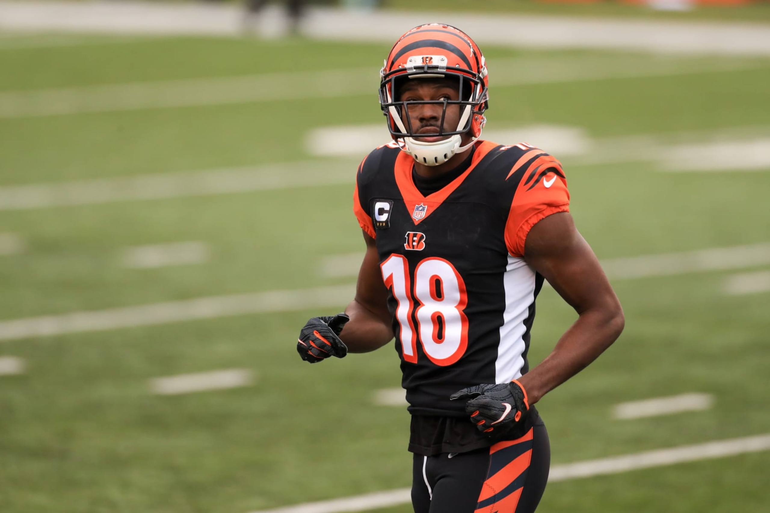 CINCINNATI, OH - JANUARY 03: Cincinnati Bengals wide receiver A.J. Green (18) looks at the scoreboard during the game against the Baltimore Ravens and the Cincinnati Bengals on January 3, 2021, at Paul Brown Stadium in Cincinnati, OH. (Photo by Ian Johnson/Icon Sportswire via Getty Images) CINCINNATI, OH - JANUARY 03: Cincinnati Bengals wide receiver A.J. Green (18) looks at the scoreboard during the game against the Baltimore Ravens and the Cincinnati Bengals on January 3, 2021, at Paul Brown Stadium in Cincinnati, OH. (Photo by Ian Johnson/Icon Sportswire via Getty Images)