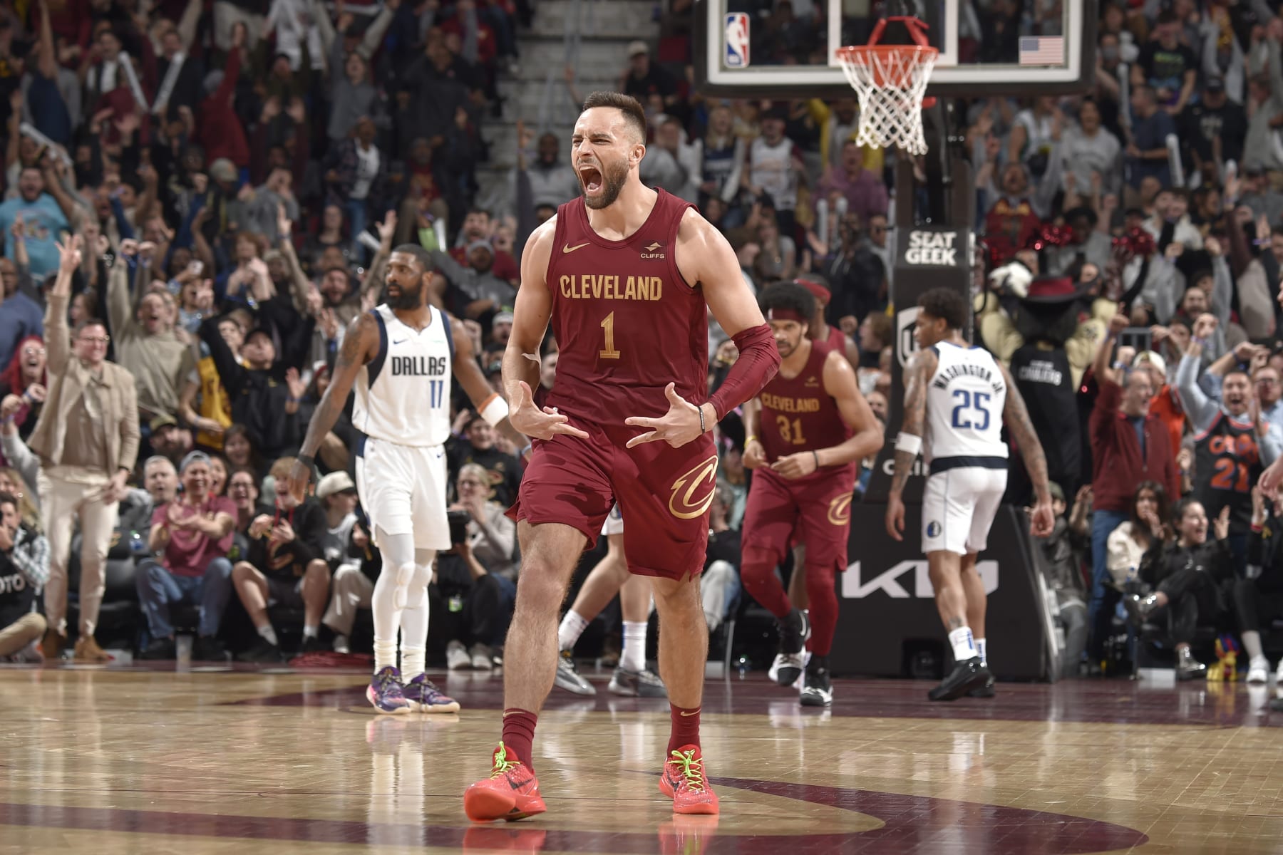 CLEVELAND, OH - FEBRUARY 27: Max Strus #1 of the Cleveland Cavaliers celebrates during the game against the Dallas Mavericks on February 27, 2024 at Rocket Mortgage FieldHouse in Cleveland, Ohio. NOTE TO USER: User expressly acknowledges and agrees that, by downloading and/or using this Photograph, user is consenting to the terms and conditions of the Getty Images License Agreement. Mandatory Copyright Notice: Copyright 2024 NBAE (Photo by David Liam Kyle/NBAE via Getty Images)