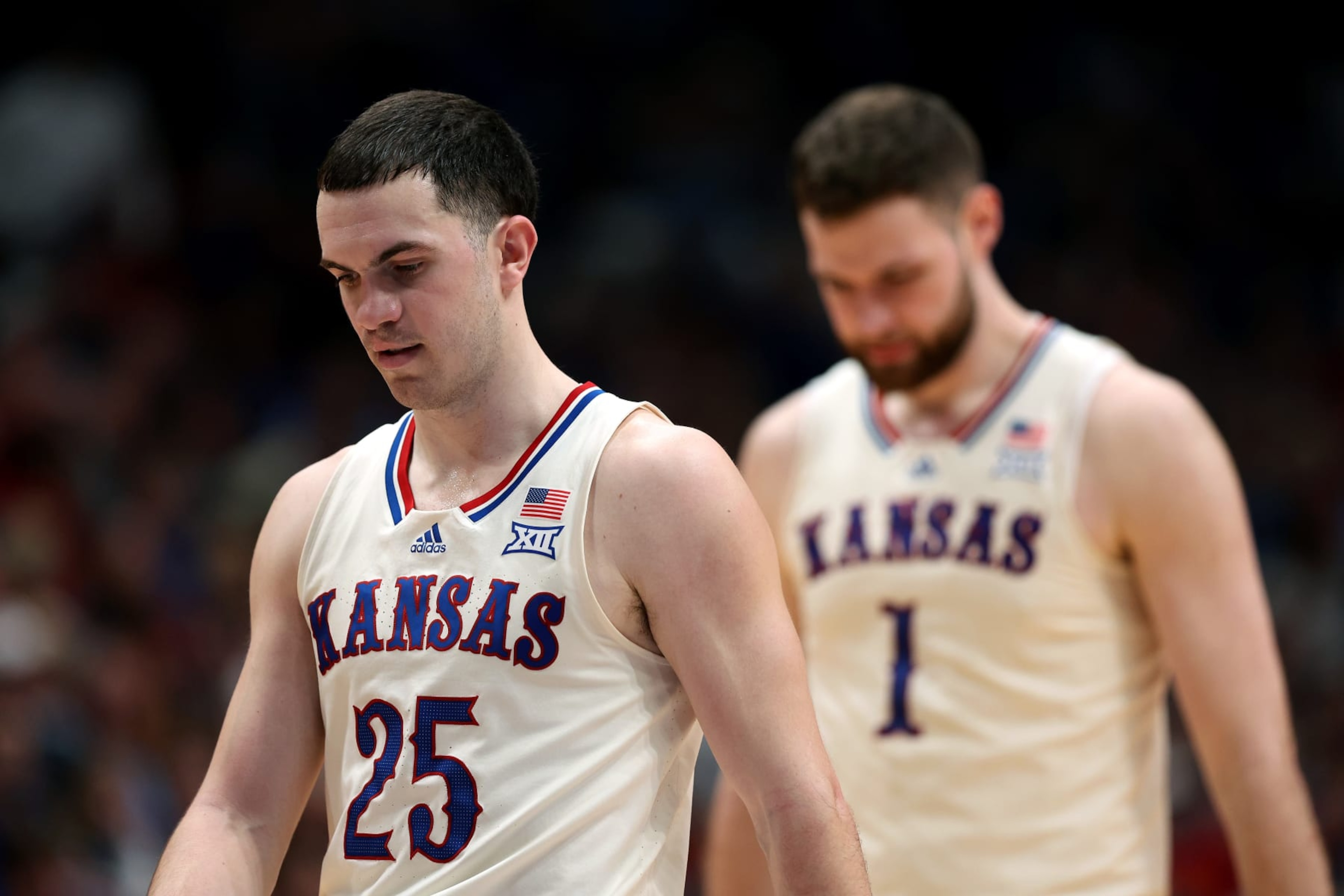 LAWRENCE, KANSAS - FEBRUARY 27: Nicolas Timberlake #25 and Hunter Dickinson #1 of the Kansas Jayhawks walk off the court during a timeout late in the 2nd half of the game against the Brigham Young Cougars at Allen Fieldhouse on February 27, 2024 in Lawrence, Kansas. BYU defeated Kansas with a final score of 76-68. (Photo by Jamie Squire/Getty Images) LAWRENCE, KANSAS - FEBRUARY 27: Nicolas Timberlake #25 and Hunter Dickinson #1 of the Kansas Jayhawks walk off the court during a timeout late in the 2nd half of the game against the Brigham Young Cougars at Allen Fieldhouse on February 27, 2024 in Lawrence, Kansas. BYU defeated Kansas with a final score of 76-68. (Photo by Jamie Squire/Getty Images)
