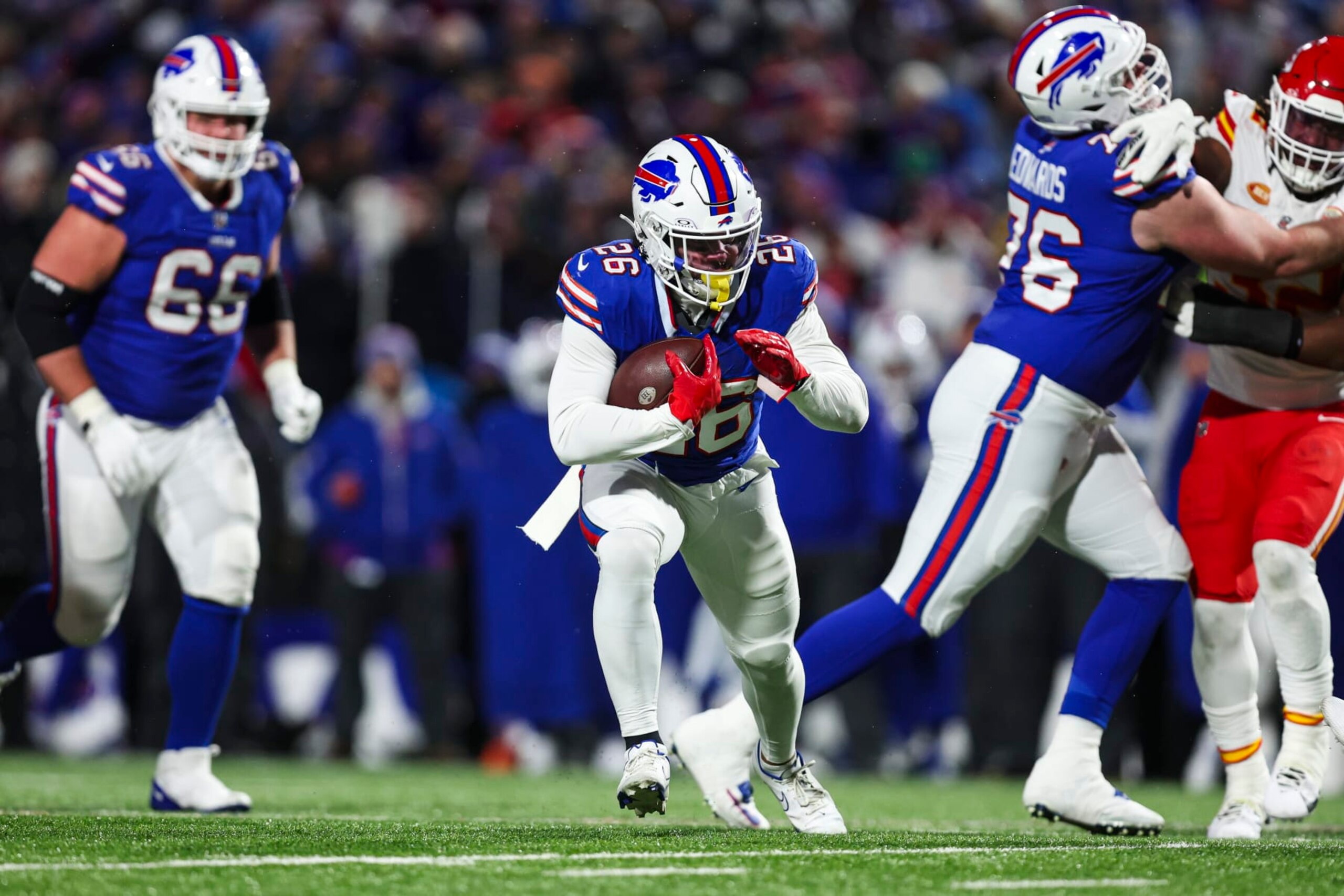 ORCHARD PARK, NY - JANUARY 21: Ty Johnson #26 of the Buffalo Bills runs the ball during an NFL divisional round playoff football game against the Kansas City Chiefs at Highmark Stadium on January 21, 2024 in Orchard Park, New York. (Photo by Perry Knotts/Getty Images) ORCHARD PARK, NY - JANUARY 21: Ty Johnson #26 of the Buffalo Bills runs the ball during an NFL divisional round playoff football game against the Kansas City Chiefs at Highmark Stadium on January 21, 2024 in Orchard Park, New York. (Photo by Perry Knotts/Getty Images)