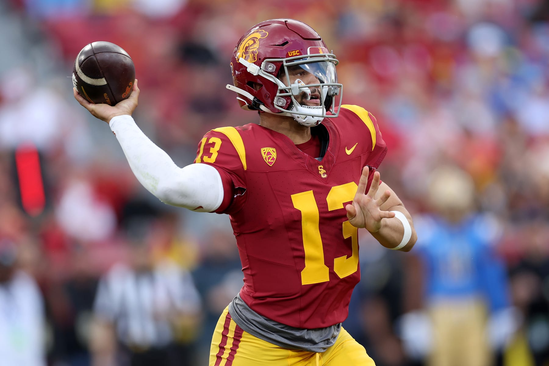 LOS ANGELES, CALIFORNIA - NOVEMBER 18: Caleb Williams #13 of the USC Trojans passes the ball during the first half of a game against the UCLA Bruins at United Airlines Field at the Los Angeles Memorial Coliseum on November 18, 2023 in Los Angeles, California. (Photo by Sean M. Haffey/Getty Images)