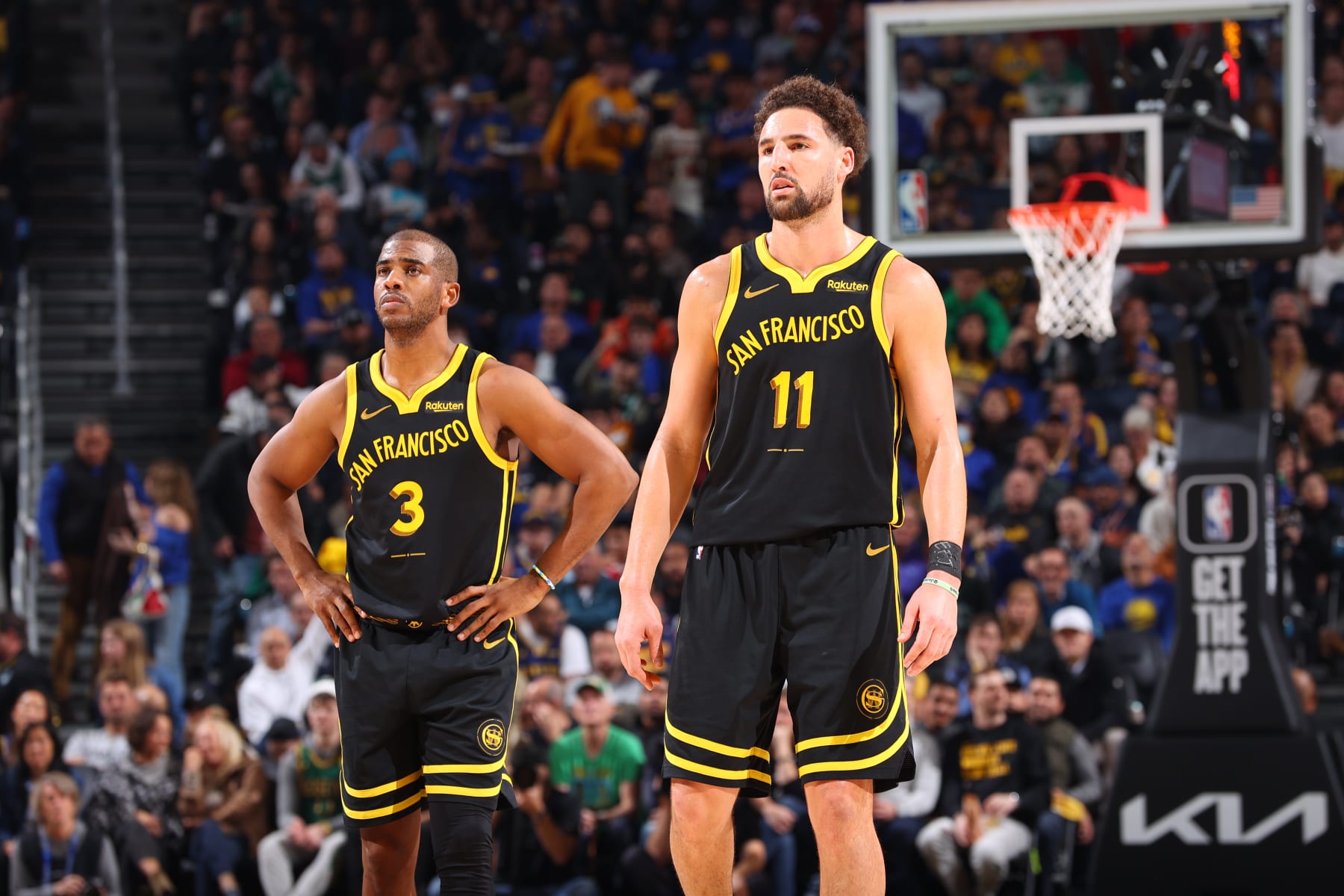 SAN FRANCISCO, CA - DECEMBER 19: Klay Thompson #11 of the Golden State Warriors and Chris Paul #3 of the Golden State Warriors looks on during the game against the Boston Celtics on December 19, 2023 at Chase Center in San Francisco, California. NOTE TO USER: User expressly acknowledges and agrees that, by downloading and or using this photograph, user is consenting to the terms and conditions of Getty Images License Agreement. Mandatory Copyright Notice: Copyright 2023 NBAE (Photo by Mike Rasay/NBAE via Getty Images)