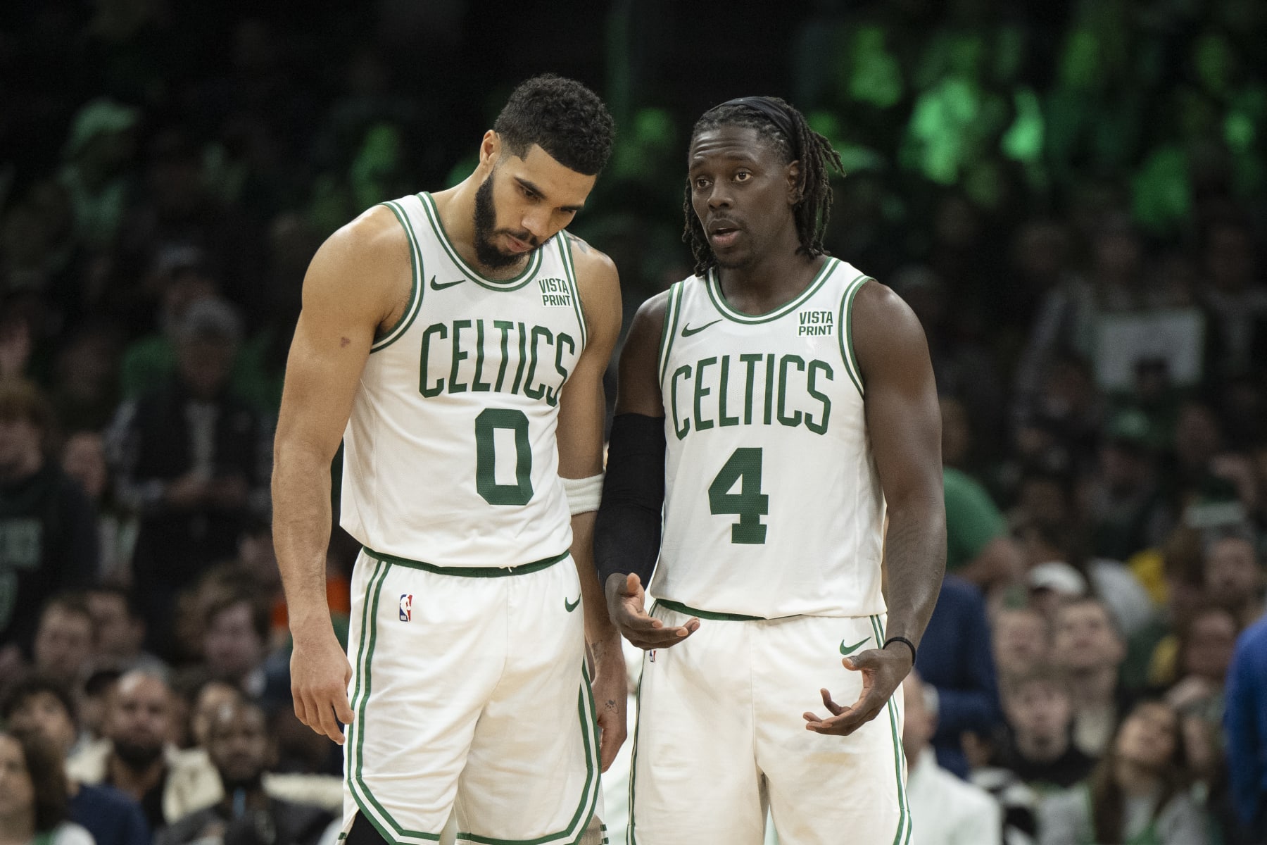 BOSTON, MASSACHUSETTS - DECEMBER 17: Jayson Tatum #0 of the Boston Celtics and Jrue Holiday #4 of the Boston Celtics talk during the second half against the Orlando Magic at TD Garden on December 17, 2023 in Boston, Massachusetts. NOTE TO USER: User expressly acknowledges and agrees that, by downloading and or using this photograph, user is consenting to the terms and conditions of the Getty Images License Agreement. (Photo by Maddie Malhotra/Getty Images)