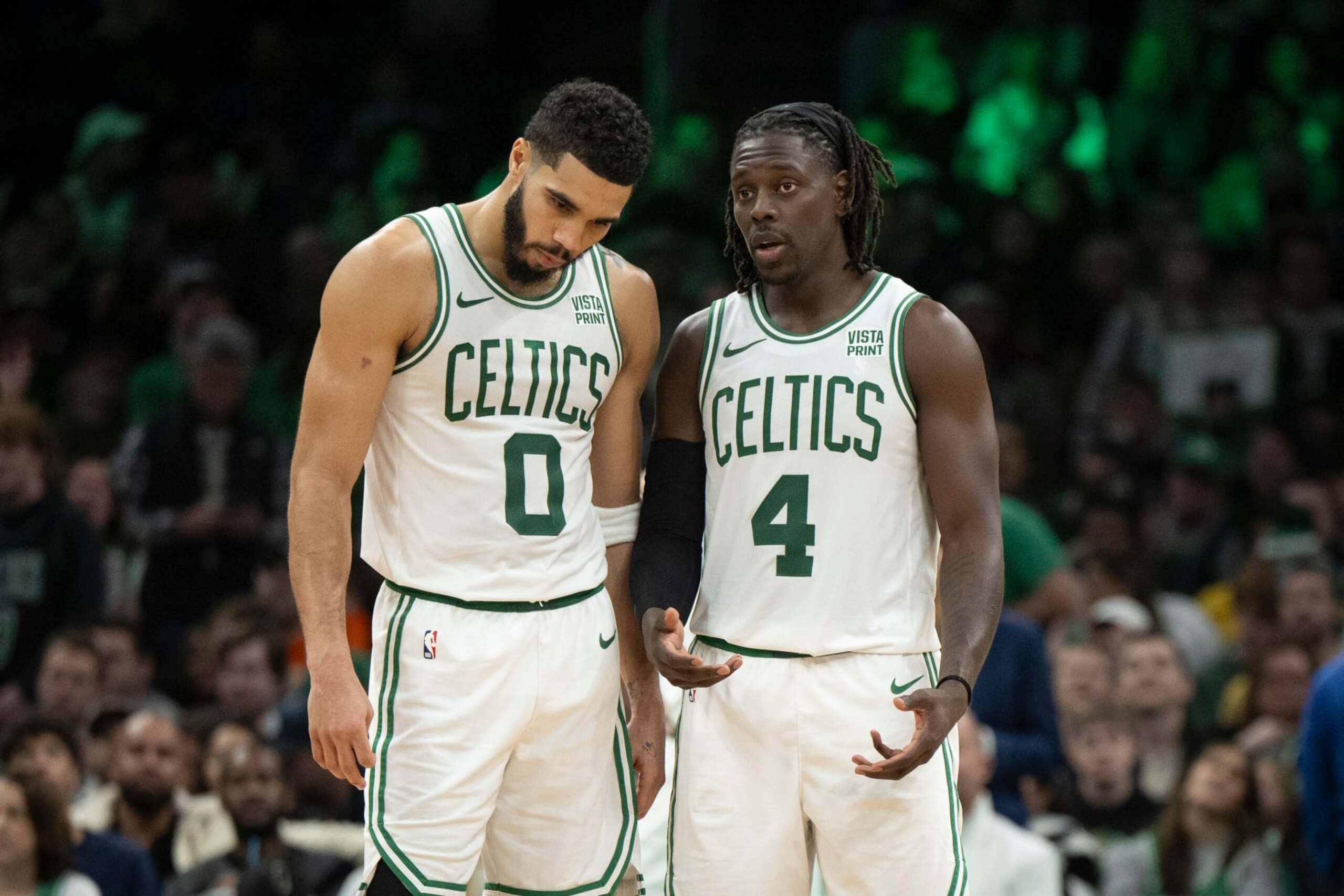 BOSTON, MASSACHUSETTS - DECEMBER 17: Jayson Tatum #0 of the Boston Celtics and Jrue Holiday #4 of the Boston Celtics talk during the second half against the Orlando Magic at TD Garden on December 17, 2023 in Boston, Massachusetts. NOTE TO USER: User expressly acknowledges and agrees that, by downloading and or using this photograph, user is consenting to the terms and conditions of the Getty Images License Agreement. (Photo by Maddie Malhotra/Getty Images)