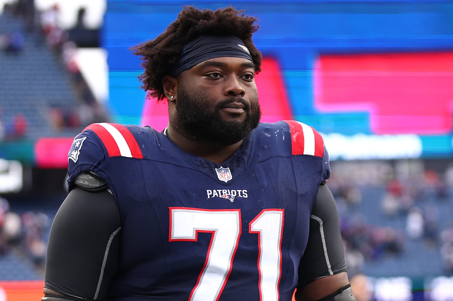 FOXBOROUGH, MASSACHUSETTS - OCTOBER 22: New England Patriots Mike Onwenu #71 walks off of the field after the Patriots defeat the Buffalo Bills at Gillette Stadium on October 22, 2023 in Foxborough, Massachusetts. (Photo by Maddie Meyer/Getty Images)