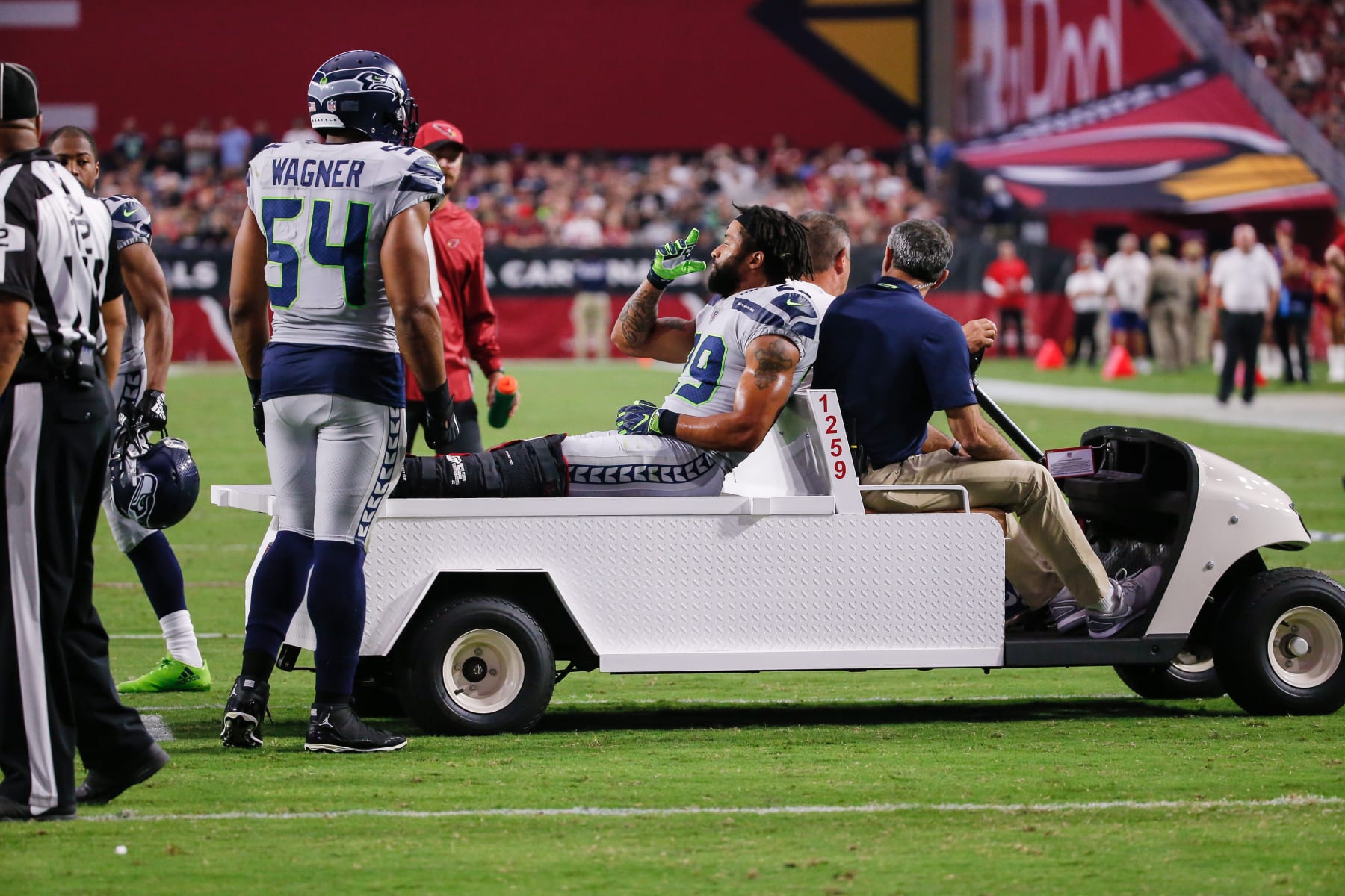 GLENDALE, AZ - SEPTEMBER 30:  Seattle Seahawks defensive back Earl Thomas (29) gestures while being carted off the field after being injured during the NFL football game between the Seattle Seahawks and the Arizona Cardinals on September 30, 2018 at State Farm Stadium in Glendale, Arizona. (Photo by Kevin Abele/Icon Sportswire via Getty Images)
