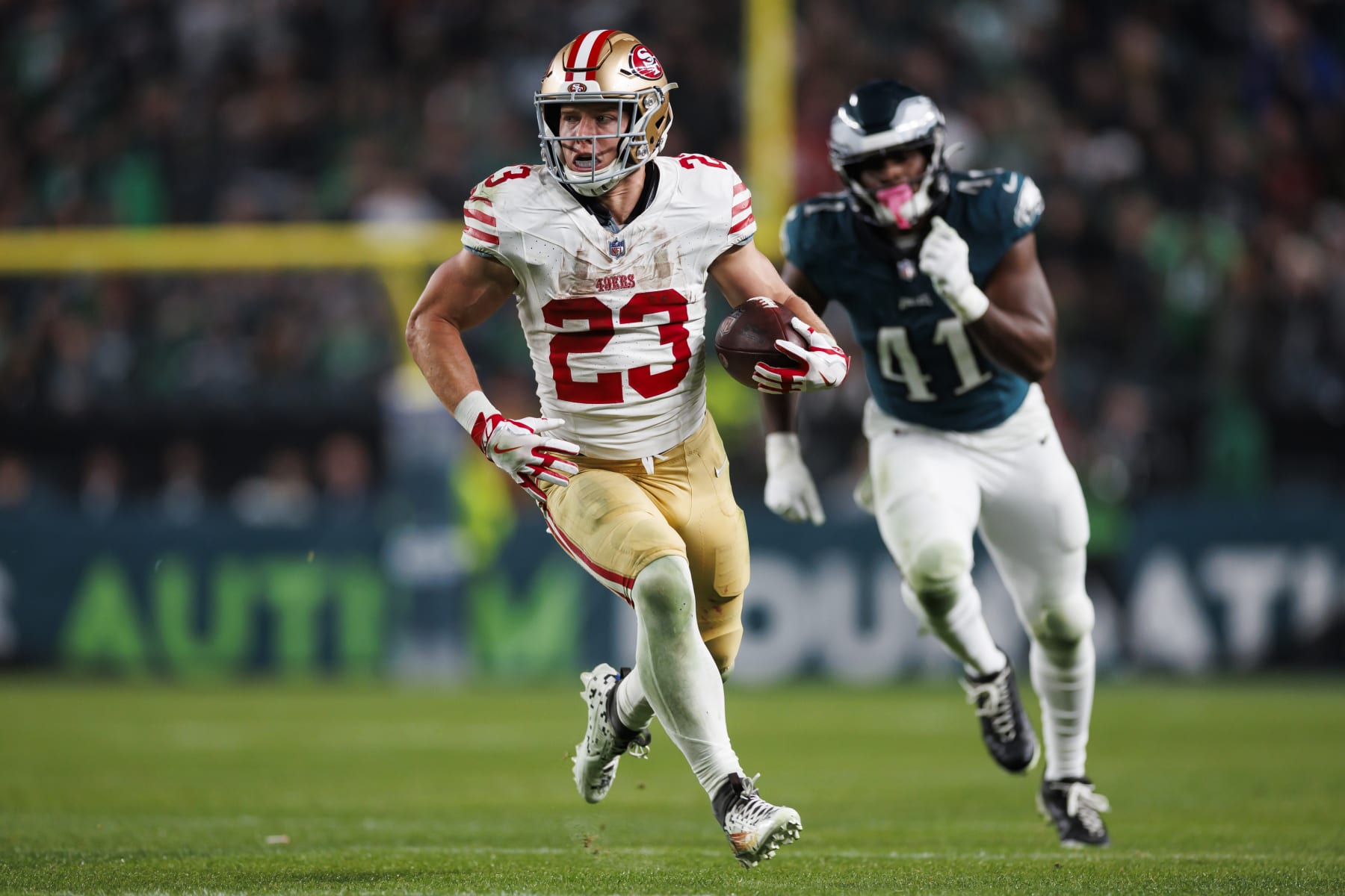 PHILADELPHIA, PENNSYLVANIA - DECEMBER 03: Christian McCaffrey #23 of the San Francisco 49ers  runs the ball after a catch during an NFL football game against the Philadelphia Eagles at Lincoln Financial Field on December 3, 2023 in Philadelphia, Pennsylvania. (Photo by Ryan Kang/Getty Images)
