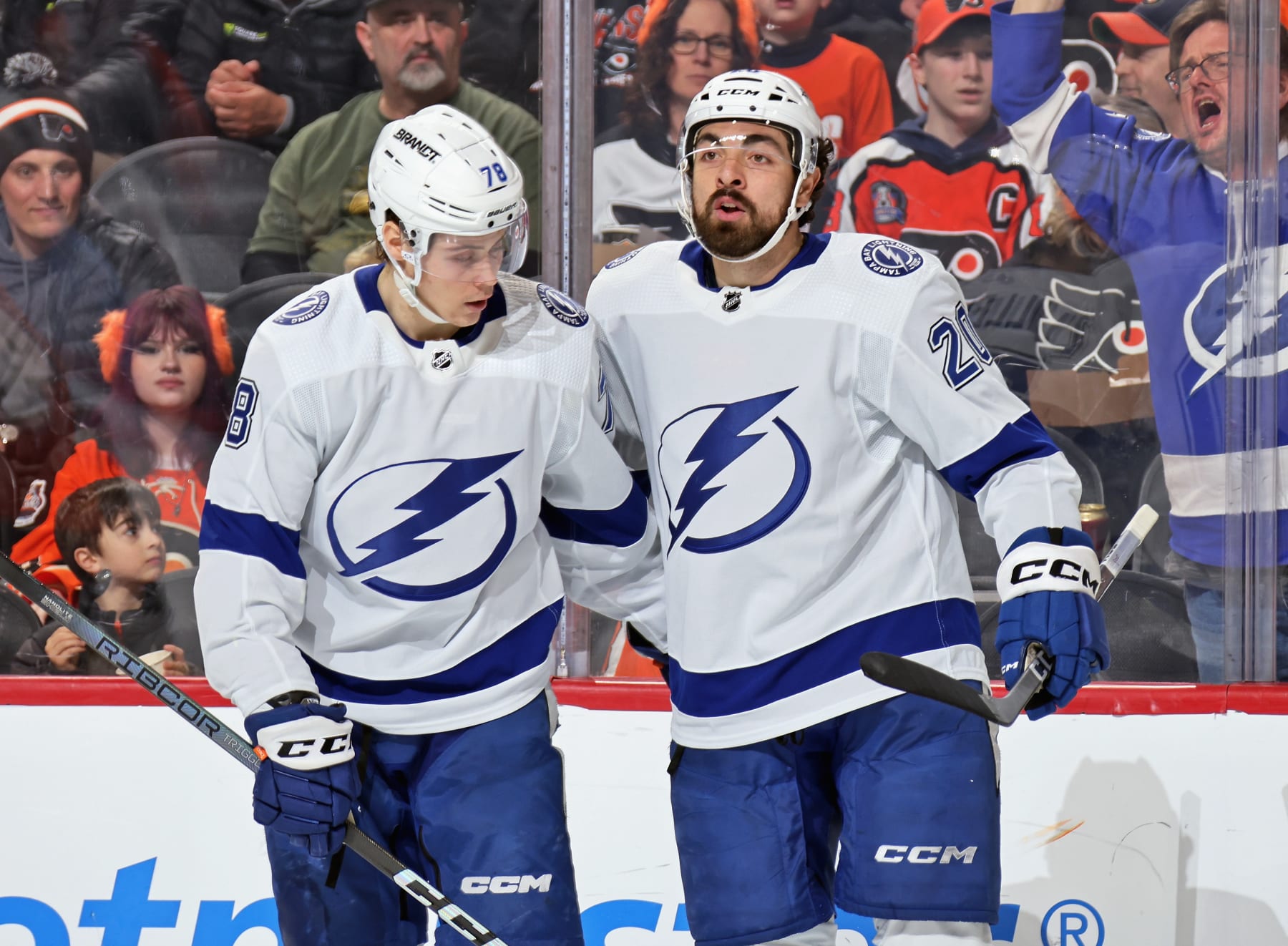 PHILADELPHIA, PENNSYLVANIA - FEBRUARY 27: Nicholas Paul #20 of the Tampa Bay Lightning celebrates his second period goal against the Philadelphia Flyers with Emil Martinsen Lilleberg #78 at the Wells Fargo Center on February 27, 2024 in Philadelphia, Pennsylvania.  (Photo by Len Redkoles/NHLI via Getty Images)