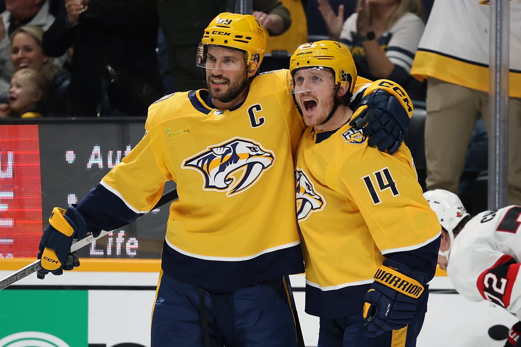 NASHVILLE, TENNESSEE - FEBRUARY 27: Roman Josi #59 and Gustav Nyquist #14 of the Nashville Predators celebrate a goal against the Ottawa Senators at Bridgestone Arena on February 27, 2024 in Nashville, Tennessee. The Nashville Predators won 4-1. (Photo by Donald Page/Getty Images)