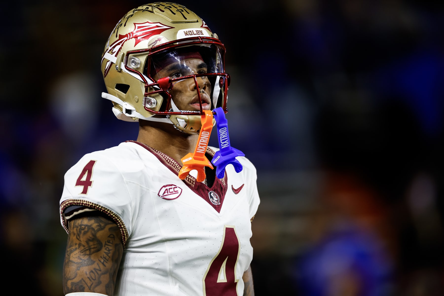 GAINESVILLE, FLORIDA - NOVEMBER 25: Keon Coleman #4 of the Florida State Seminoles warms up before the start of a game against the Florida Gators at Ben Hill Griffin Stadium on November 25, 2023 in Gainesville, Florida. (Photo by James Gilbert/Getty Images)
