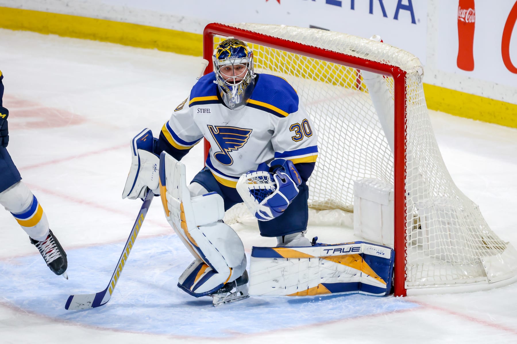 WINNIPEG, CANADA - FEBRUARY 27: Goaltender Joel Hofer #30 of the St. Louis Blues guards the net during second period action against the Winnipeg Jets at the Canada Life Centre on February 27, 2024 in Winnipeg, Manitoba, Canada. (Photo by Jonathan Kozub/NHLI via Getty Images)