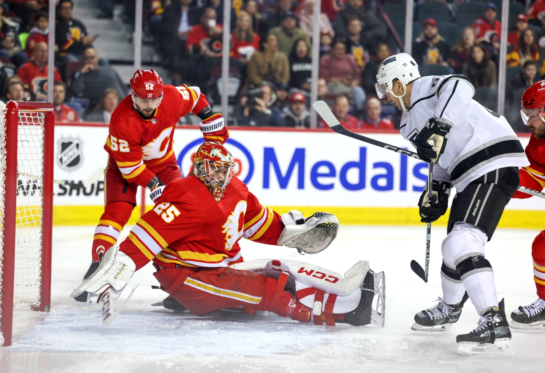 CALGARY, CANADA - FEBRUARY 27: Goaltender Jacob Markstrom #25 of the Calgary Flames makes a save on Trevor Lewis #61 of the Los Angeles Kings during the first period at the Scotiabank Saddledome on February 27, 2024 in Calgary, Alberta, Canada. (Photo by Leah Hennel/Getty Images)
