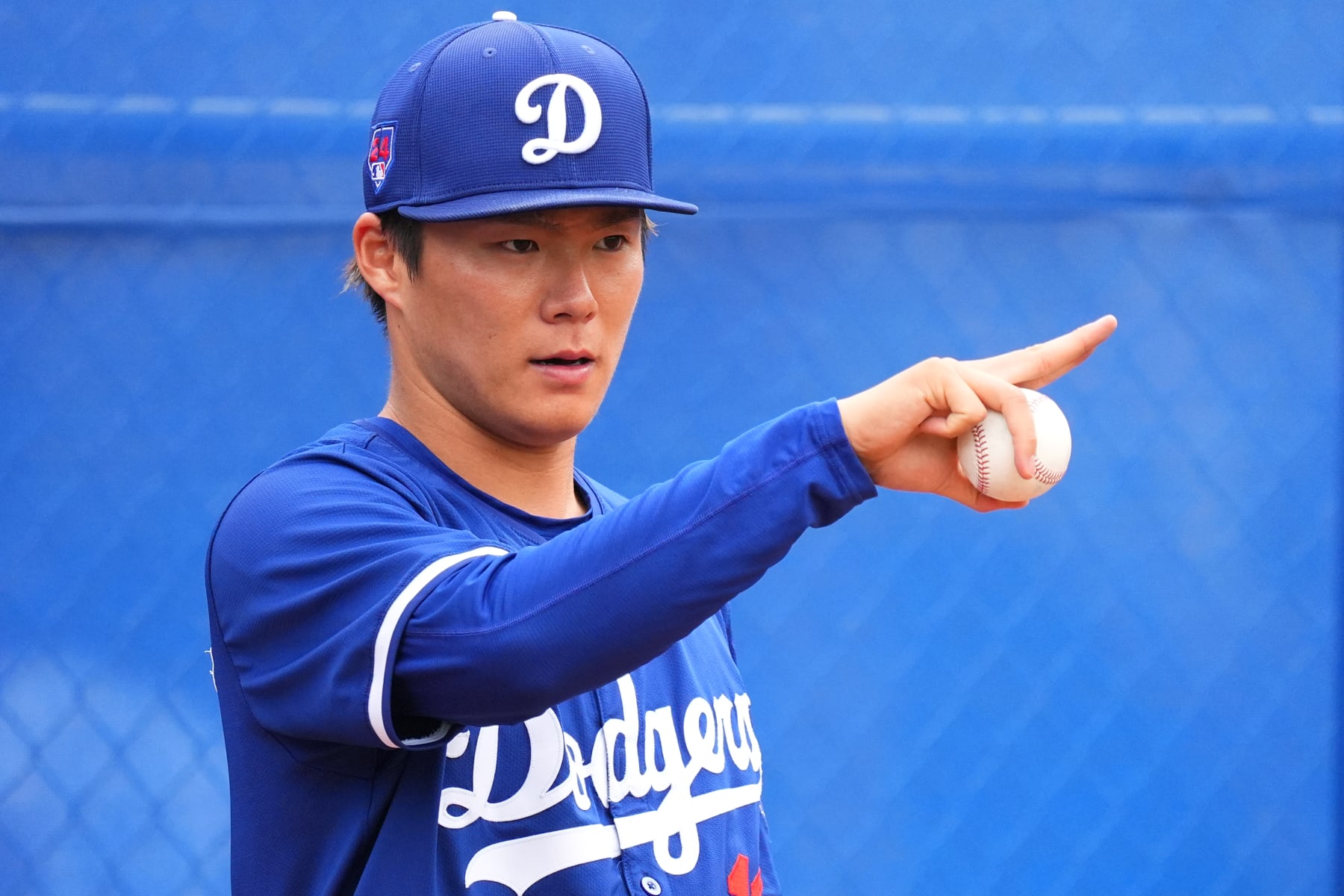 GLENDALE, ARIZONA - FEBRUARY 26: Yoshinobu Yamamoto of the Los Angeles Dodgers pitches in the bullpen during a spring training session at Camelback Ranch on February 26, 2024 in Glendale, Arizona. (Photo by Masterpress/Getty Images)