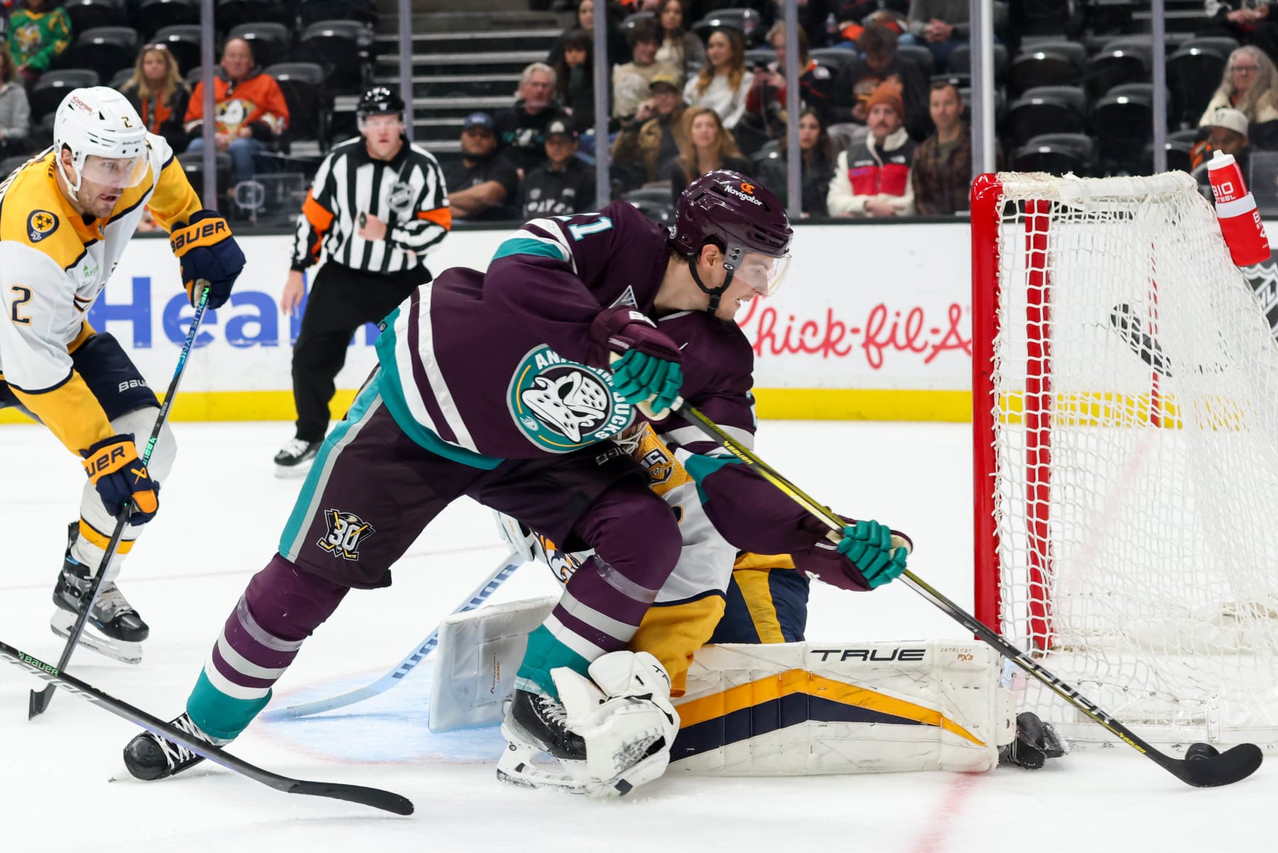 ANAHEIM, CA - FEBRUARY 25:  Isac Lundestrom #21 of the Anaheim Ducks skates with the puck during the third period against the Nashville Predators at Honda Center on February 25, 2024 in Anaheim, California. (Photo by Debora Robinson/NHLI via Getty Images)