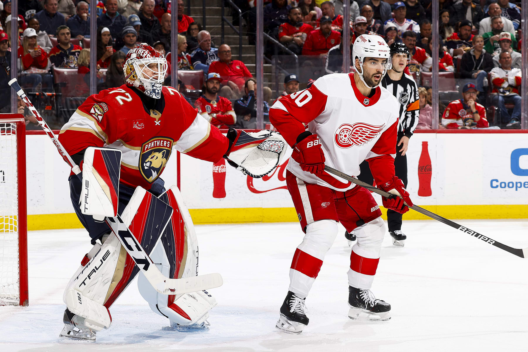 SUNRISE, FL - JANUARY 17: Joseph Veleno #90 of the Detroit Red Wings waits for a pass in front of goaltender Sergei Bobrovsky #72 of the Florida Panthers at the Amerant Bank Arena on January 17, 2024 in Sunrise, Florida. (Photo by Joel Auerbach/Getty Images)