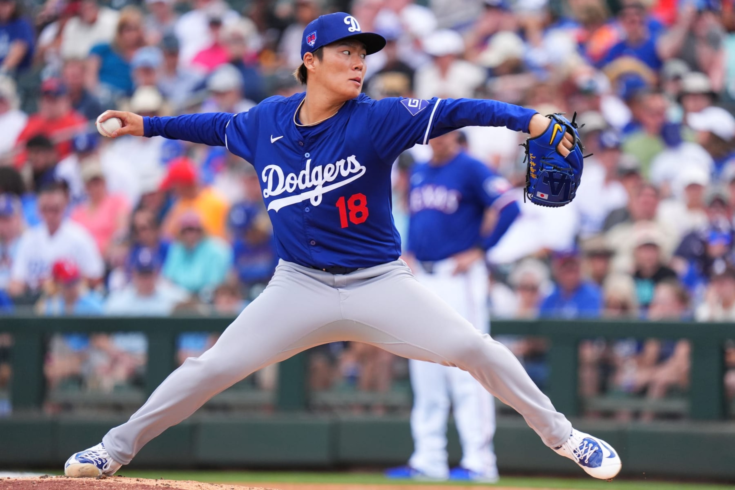 SURPRISE, ARIZONA - FEBRUARY 28: Yoshinobu Yamamoto #18 of the Los Angeles Dodgers pitches during a game against the Texas Rangers at Surprise Stadium on February 28, 2024 in Surprise, Arizona. (Photo by Masterpress/Getty Images) SURPRISE, ARIZONA - FEBRUARY 28: Yoshinobu Yamamoto #18 of the Los Angeles Dodgers pitches during a game against the Texas Rangers at Surprise Stadium on February 28, 2024 in Surprise, Arizona. (Photo by Masterpress/Getty Images)