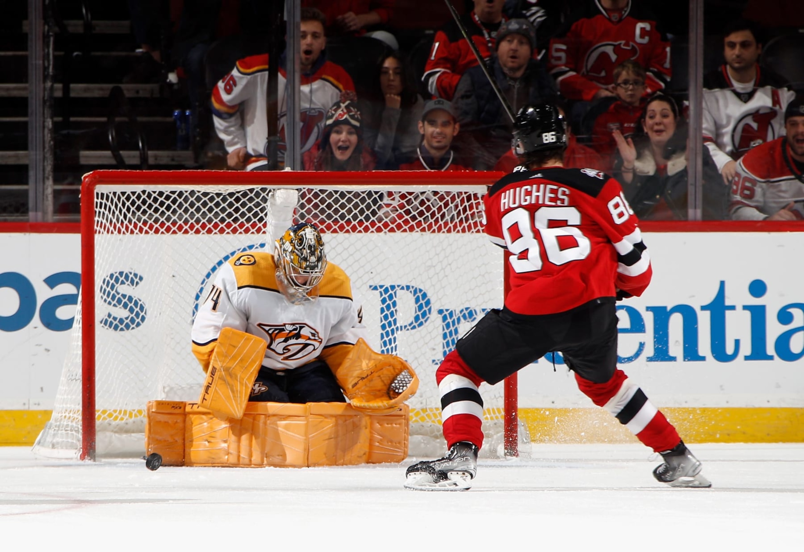 NEWARK, NEW JERSEY - DECEMBER 01: Juuse Saros #74 of the Nashville Predators makes the second period save on Jack Hughes #86 of the New Jersey Devils at the Prudential Center on December 01, 2022 in Newark, New Jersey. The Predators defeated the Devils 4-3 in overtime. (Photo by Bruce Bennett/Getty Images) NEWARK, NEW JERSEY - DECEMBER 01: Juuse Saros #74 of the Nashville Predators makes the second period save on Jack Hughes #86 of the New Jersey Devils at the Prudential Center on December 01, 2022 in Newark, New Jersey. The Predators defeated the Devils 4-3 in overtime. (Photo by Bruce Bennett/Getty Images)