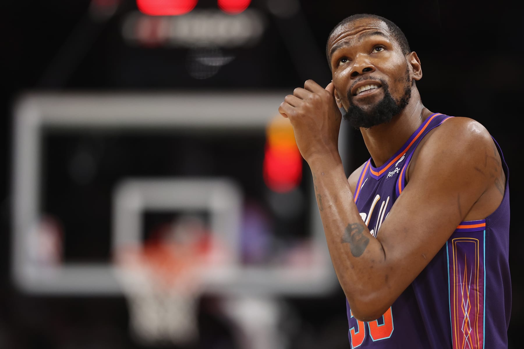 PHOENIX, ARIZONA - FEBRUARY 25: Kevin Durant #35 of the Phoenix Suns reacts during the first half of the NBA game against the Los Angeles Lakersat Footprint Center on February 25, 2024 in Phoenix, Arizona. NOTE TO USER: User expressly acknowledges and agrees that, by downloading and or using this photograph, User is consenting to the terms and conditions of the Getty Images License Agreement.  (Photo by Christian Petersen/Getty Images)
