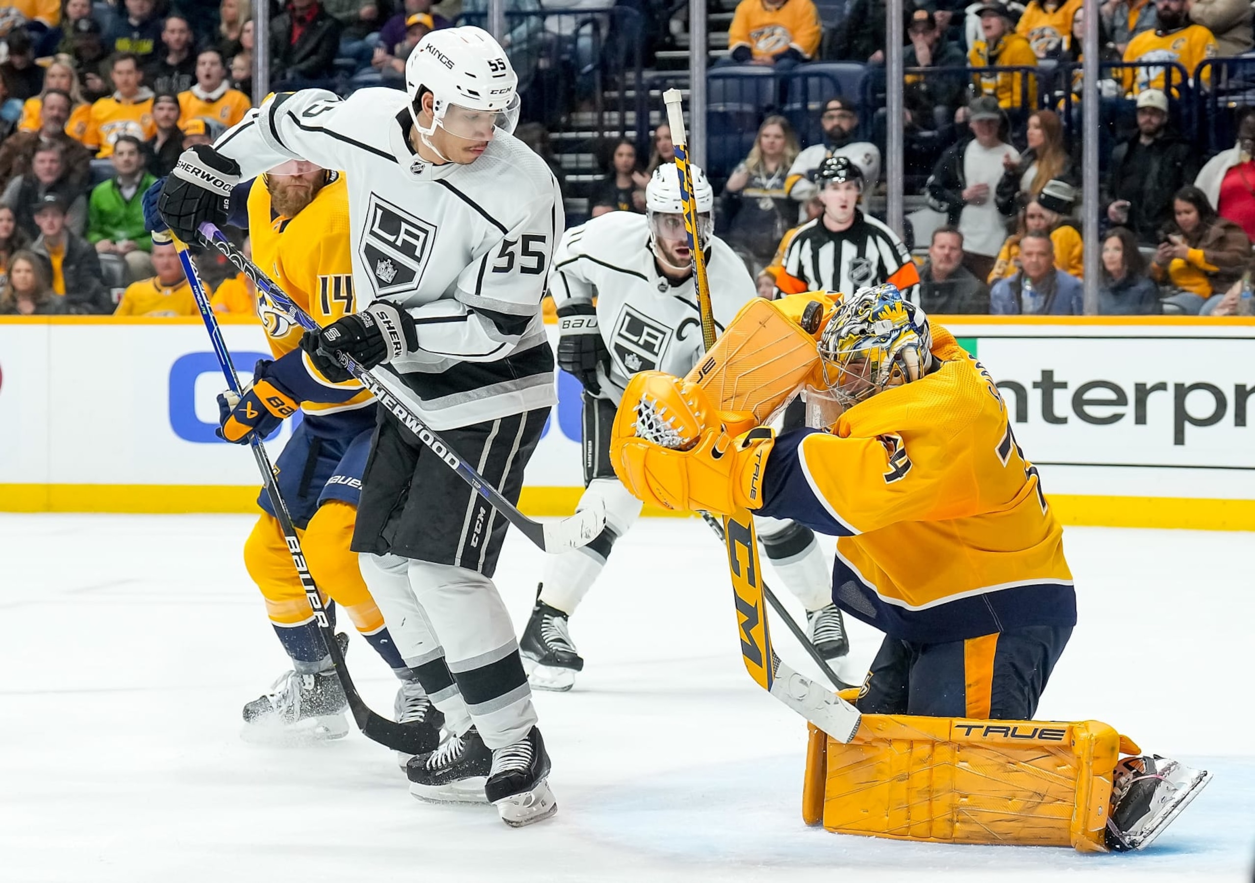 NASHVILLE, TENNESSEE - JANUARY 21: Juuse Saros #74 of the Nashville Predators makes the save against Quinton Byfield #55 of the Los Angeles Kings during an NHL game at Bridgestone Arena on January 21, 2023 in Nashville, Tennessee. (Photo by John Russell/NHLI via Getty Images) NASHVILLE, TENNESSEE - JANUARY 21: Juuse Saros #74 of the Nashville Predators makes the save against Quinton Byfield #55 of the Los Angeles Kings during an NHL game at Bridgestone Arena on January 21, 2023 in Nashville, Tennessee. (Photo by John Russell/NHLI via Getty Images)