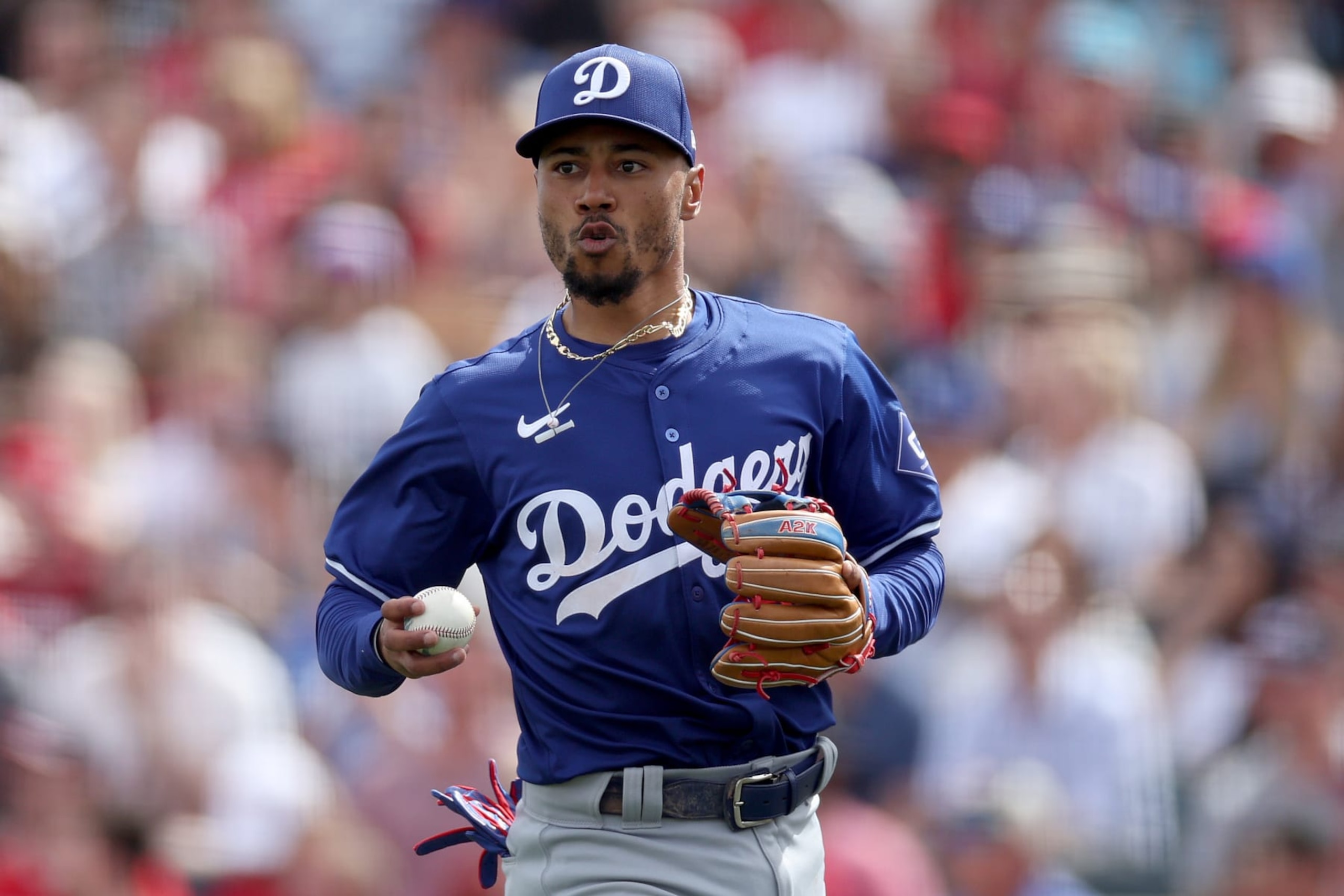 TEMPE, ARIZONA - FEBRUARY 24: Mookie Betts #50 of the Los Angeles Dodgers reacts after a play against the Los Angeles Angels during a spring training exhibition at the Peoria Sports Complex on February 24, 2024 in Tempe, Arizona. (Photo by Steph Chambers/Getty Images)