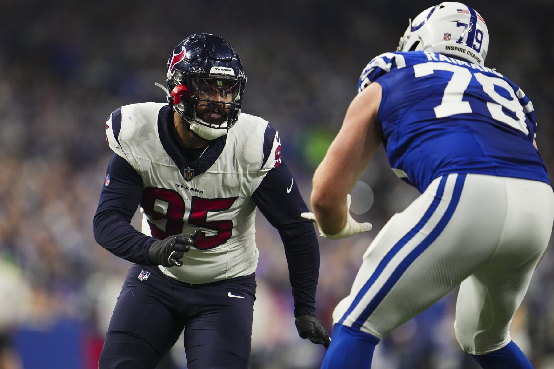 INDIANAPOLIS, IN - JANUARY 06: Derek Barnett #95 of the Houston Texans rushes the passer during an NFL football game against the Indianapolis Colts at Lucas Oil Stadium on January 6, 2024 in Indianapolis, Indiana. (Photo by Cooper Neill/Getty Images)