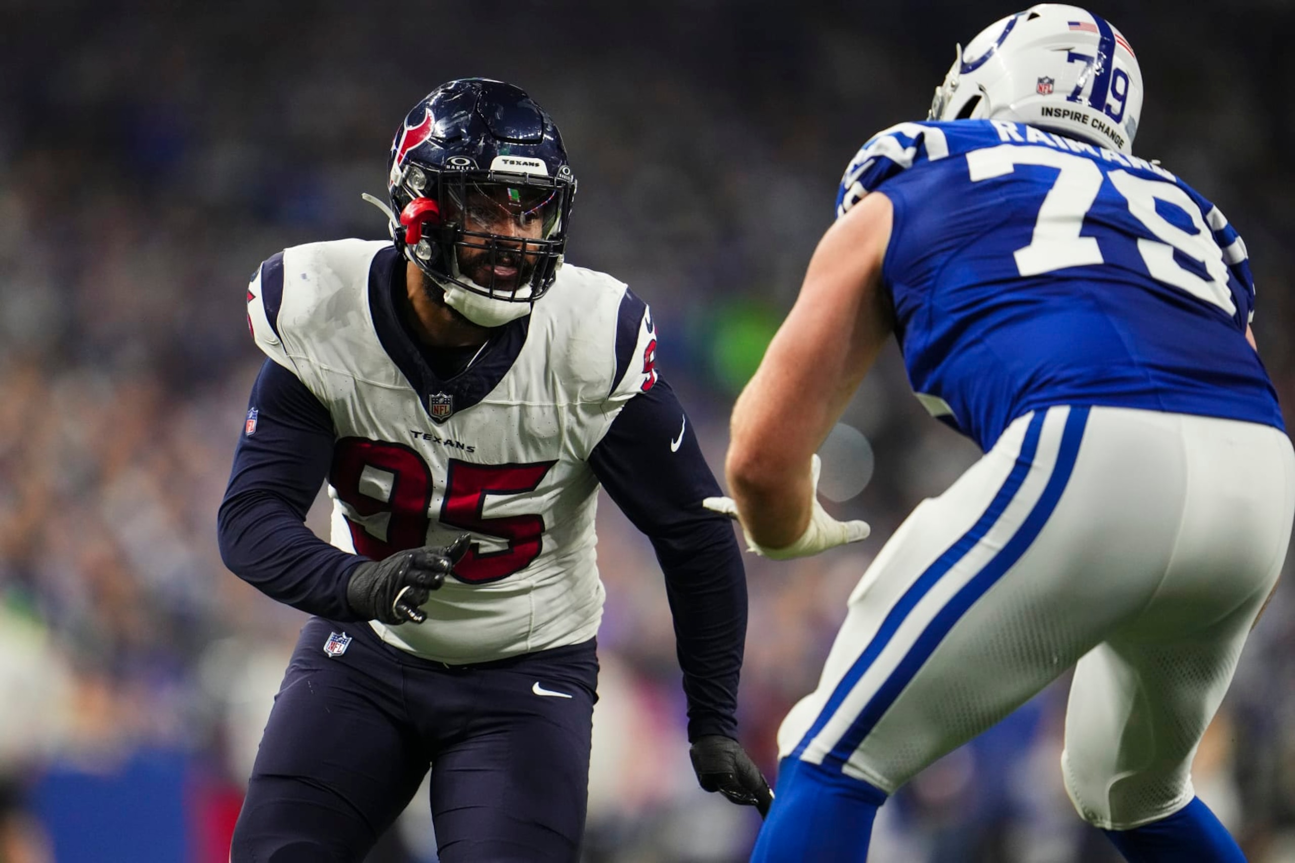 INDIANAPOLIS, IN - JANUARY 06: Derek Barnett #95 of the Houston Texans rushes the passer during an NFL football game against the Indianapolis Colts at Lucas Oil Stadium on January 6, 2024 in Indianapolis, Indiana. (Photo by Cooper Neill/Getty Images)